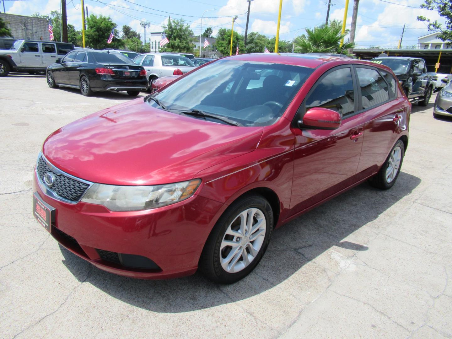 2011 Red /Black Kia Forte 5-Door EX (KNAFU5A24B5) with an 2.0L L4 DOHC 16V engine, Automatic transmission, located at 1511 North Shepherd Dr., Houston, TX, 77008, (281) 657-1221, 29.798361, -95.412560 - 2011 Kia Forte5 EX 135,659 miles VIN: KNAFU5A24B5320128 Vehicle Details Hatchback 4 DR 2.0L I4 F DOHC 16V Gasoline Front wheel drive- Photo#23