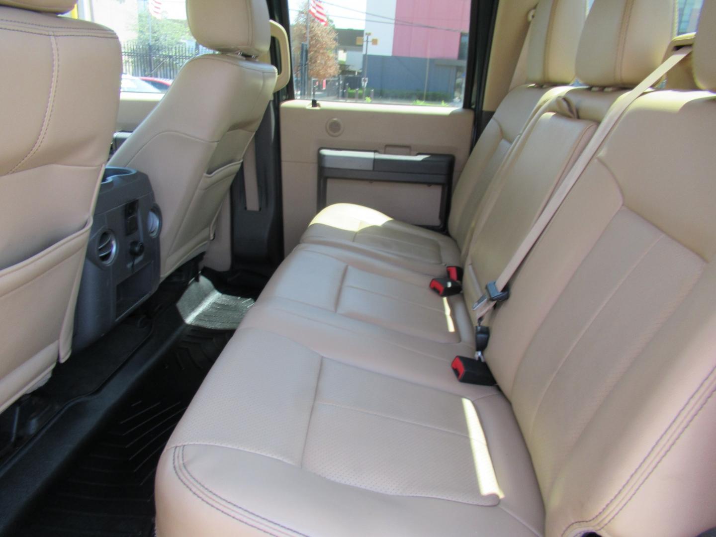2012 Green /Tan Ford F-250 SD King Ranch Crew Cab 4WD (1FT7W2B62CE) with an 6.2L V8 OHV 16V engine, 6-Speed Automatic transmission, located at 1511 North Shepherd Dr., Houston, TX, 77008, (281) 657-1221, 29.798361, -95.412560 - 2012 Ford F-250 Super Duty Lariat 202,134 miles VIN: 1FT7W2B62CEA02897 Details Crew Pickup 6.2L V8 F SOHC 16V Gasoline Rear wheel drive w/ 4X4- Photo#2