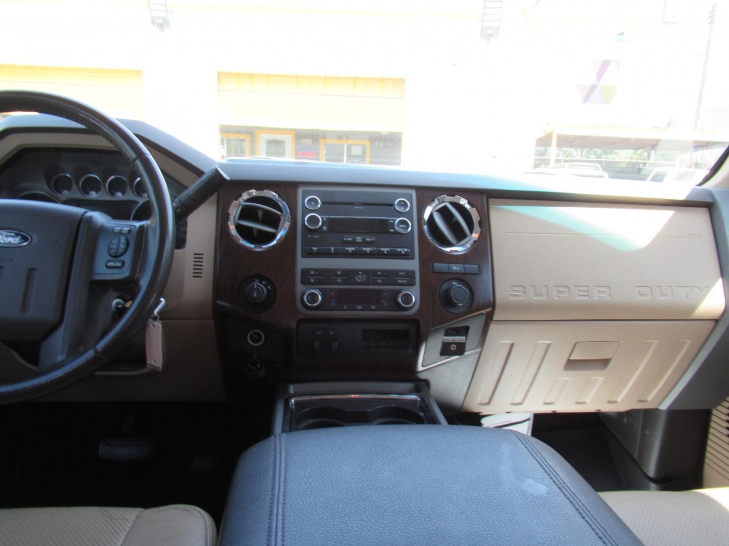 2012 Green /Tan Ford F-250 SD King Ranch Crew Cab 4WD (1FT7W2B62CE) with an 6.2L V8 OHV 16V engine, 6-Speed Automatic transmission, located at 1511 North Shepherd Dr., Houston, TX, 77008, (281) 657-1221, 29.798361, -95.412560 - 2012 Ford F-250 Super Duty Lariat 202,134 miles VIN: 1FT7W2B62CEA02897 Details Crew Pickup 6.2L V8 F SOHC 16V Gasoline Rear wheel drive w/ 4X4- Photo#4