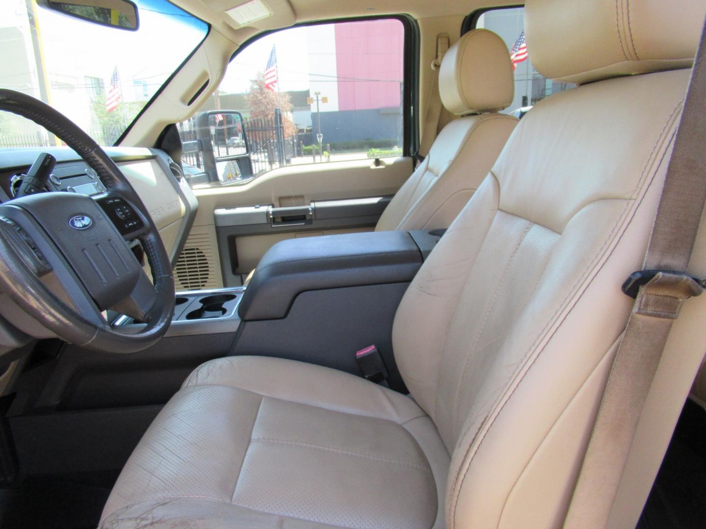 2012 Green /Tan Ford F-250 SD King Ranch Crew Cab 4WD (1FT7W2B62CE) with an 6.2L V8 OHV 16V engine, 6-Speed Automatic transmission, located at 1511 North Shepherd Dr., Houston, TX, 77008, (281) 657-1221, 29.798361, -95.412560 - 2012 Ford F-250 Super Duty Lariat 202,134 miles VIN: 1FT7W2B62CEA02897 Details Crew Pickup 6.2L V8 F SOHC 16V Gasoline Rear wheel drive w/ 4X4- Photo#6