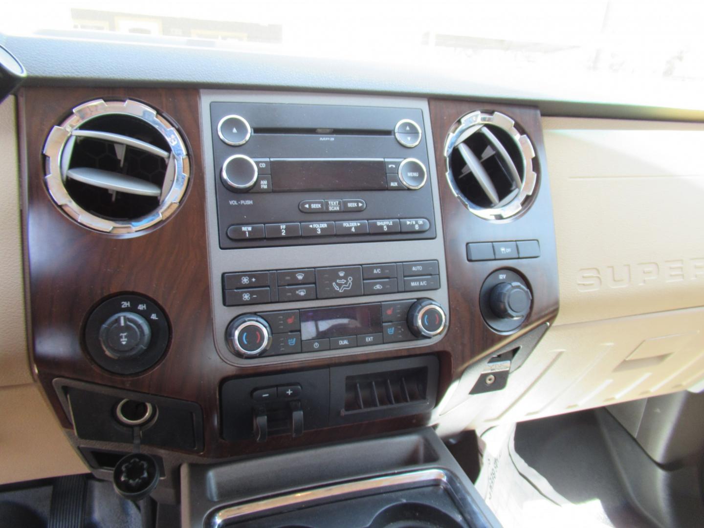 2012 Green /Tan Ford F-250 SD King Ranch Crew Cab 4WD (1FT7W2B62CE) with an 6.2L V8 OHV 16V engine, 6-Speed Automatic transmission, located at 1511 North Shepherd Dr., Houston, TX, 77008, (281) 657-1221, 29.798361, -95.412560 - 2012 Ford F-250 Super Duty Lariat 202,134 miles VIN: 1FT7W2B62CEA02897 Details Crew Pickup 6.2L V8 F SOHC 16V Gasoline Rear wheel drive w/ 4X4- Photo#7
