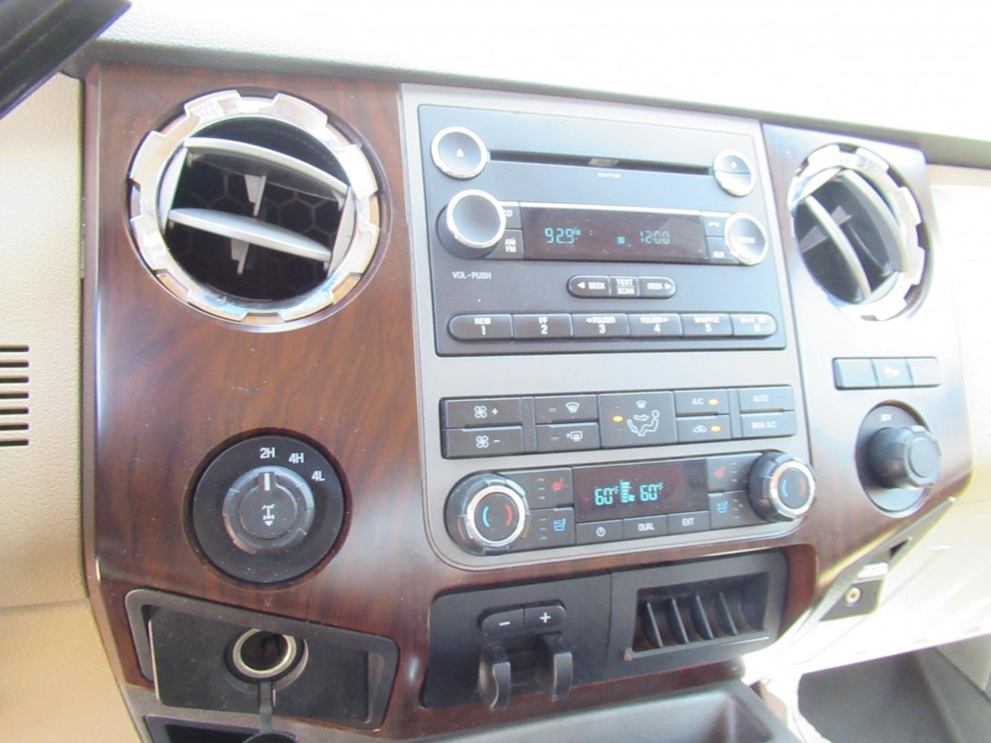 2012 Green /Tan Ford F-250 SD King Ranch Crew Cab 4WD (1FT7W2B62CE) with an 6.2L V8 OHV 16V engine, 6-Speed Automatic transmission, located at 1511 North Shepherd Dr., Houston, TX, 77008, (281) 657-1221, 29.798361, -95.412560 - 2012 Ford F-250 Super Duty Lariat 202,134 miles VIN: 1FT7W2B62CEA02897 Details Crew Pickup 6.2L V8 F SOHC 16V Gasoline Rear wheel drive w/ 4X4- Photo#10