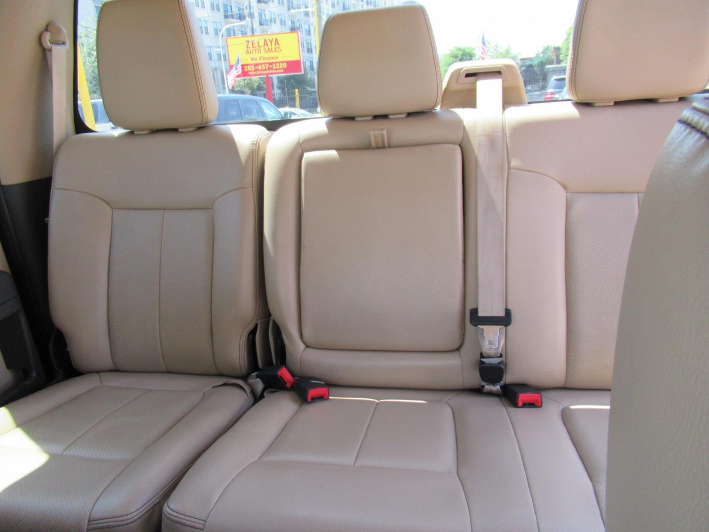 2012 Green /Tan Ford F-250 SD King Ranch Crew Cab 4WD (1FT7W2B62CE) with an 6.2L V8 OHV 16V engine, 6-Speed Automatic transmission, located at 1511 North Shepherd Dr., Houston, TX, 77008, (281) 657-1221, 29.798361, -95.412560 - 2012 Ford F-250 Super Duty Lariat 202,134 miles VIN: 1FT7W2B62CEA02897 Details Crew Pickup 6.2L V8 F SOHC 16V Gasoline Rear wheel drive w/ 4X4- Photo#12