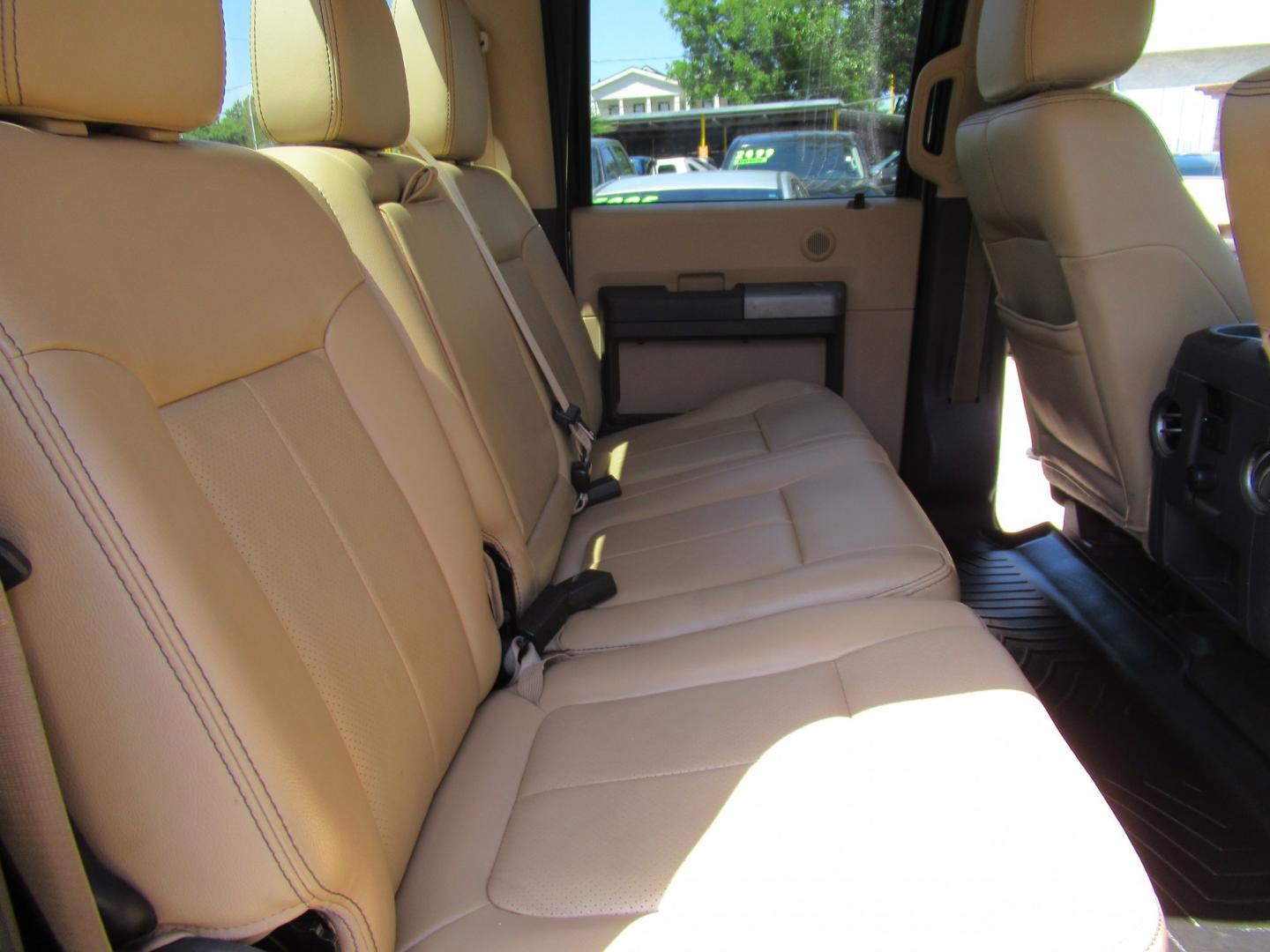 2012 Green /Tan Ford F-250 SD King Ranch Crew Cab 4WD (1FT7W2B62CE) with an 6.2L V8 OHV 16V engine, 6-Speed Automatic transmission, located at 1511 North Shepherd Dr., Houston, TX, 77008, (281) 657-1221, 29.798361, -95.412560 - 2012 Ford F-250 Super Duty Lariat 202,134 miles VIN: 1FT7W2B62CEA02897 Details Crew Pickup 6.2L V8 F SOHC 16V Gasoline Rear wheel drive w/ 4X4- Photo#13