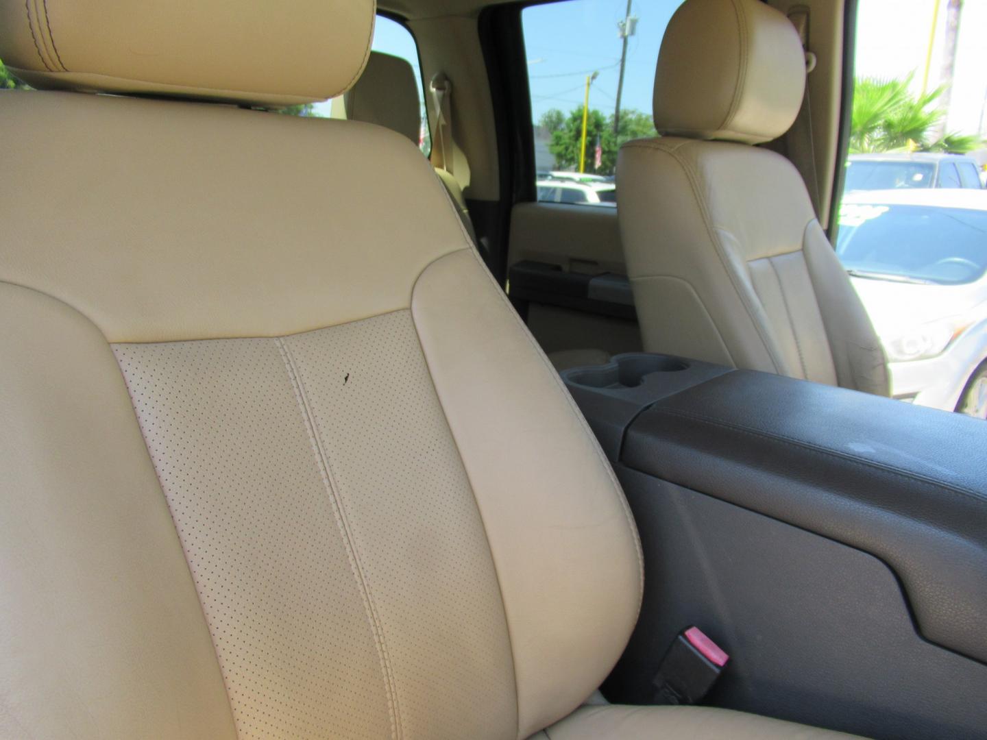 2012 Green /Tan Ford F-250 SD King Ranch Crew Cab 4WD (1FT7W2B62CE) with an 6.2L V8 OHV 16V engine, 6-Speed Automatic transmission, located at 1511 North Shepherd Dr., Houston, TX, 77008, (281) 657-1221, 29.798361, -95.412560 - 2012 Ford F-250 Super Duty Lariat 202,134 miles VIN: 1FT7W2B62CEA02897 Details Crew Pickup 6.2L V8 F SOHC 16V Gasoline Rear wheel drive w/ 4X4- Photo#15