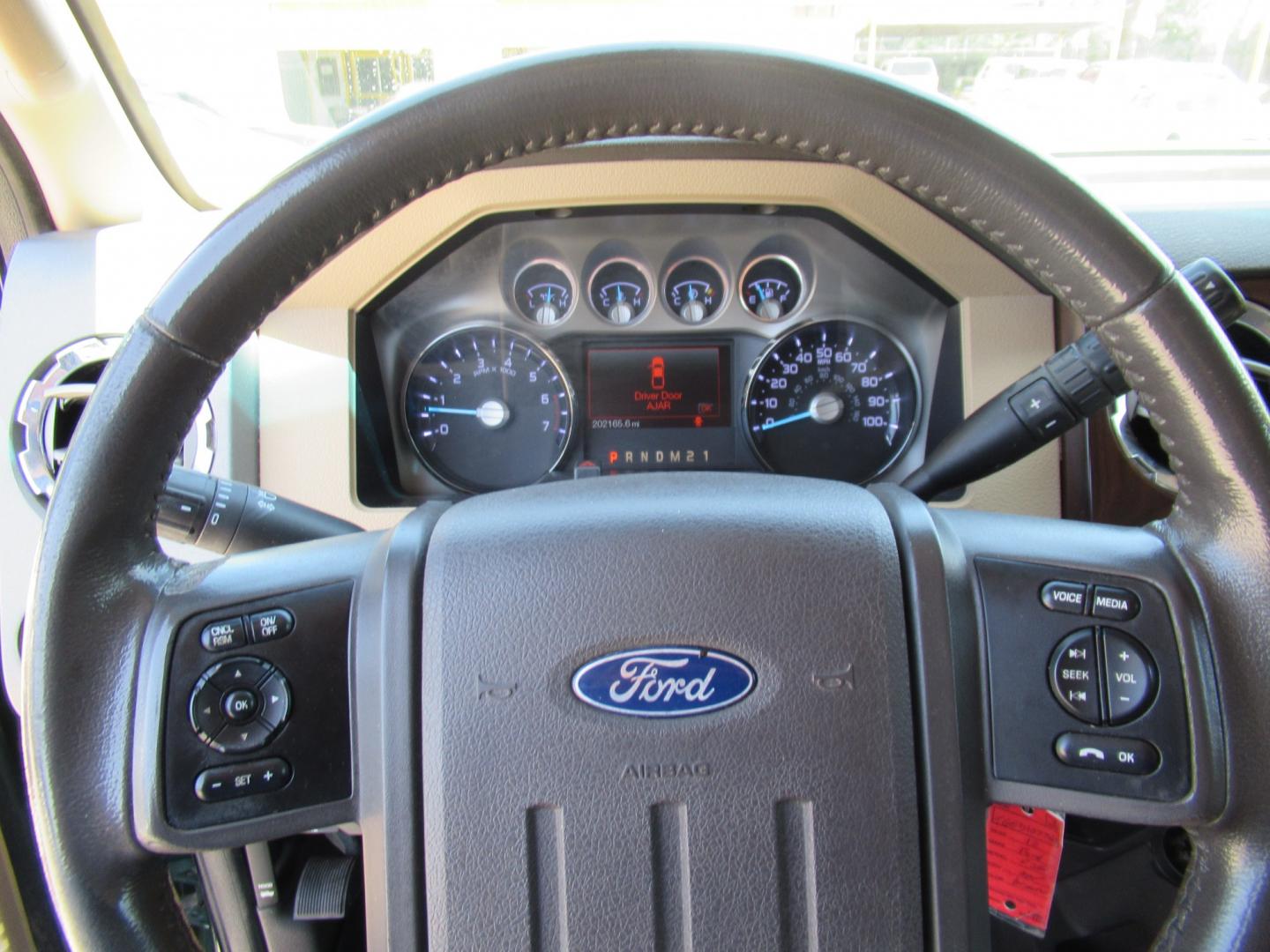 2012 Green /Tan Ford F-250 SD King Ranch Crew Cab 4WD (1FT7W2B62CE) with an 6.2L V8 OHV 16V engine, 6-Speed Automatic transmission, located at 1511 North Shepherd Dr., Houston, TX, 77008, (281) 657-1221, 29.798361, -95.412560 - 2012 Ford F-250 Super Duty Lariat 202,134 miles VIN: 1FT7W2B62CEA02897 Details Crew Pickup 6.2L V8 F SOHC 16V Gasoline Rear wheel drive w/ 4X4- Photo#17