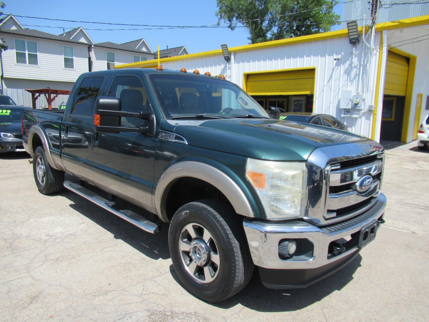 2012 Green /Tan Ford F-250 SD King Ranch Crew Cab 4WD (1FT7W2B62CE) with an 6.2L V8 OHV 16V engine, 6-Speed Automatic transmission, located at 1511 North Shepherd Dr., Houston, TX, 77008, (281) 657-1221, 29.798361, -95.412560 - 2012 Ford F-250 Super Duty Lariat 202,134 miles VIN: 1FT7W2B62CEA02897 Details Crew Pickup 6.2L V8 F SOHC 16V Gasoline Rear wheel drive w/ 4X4- Photo#23