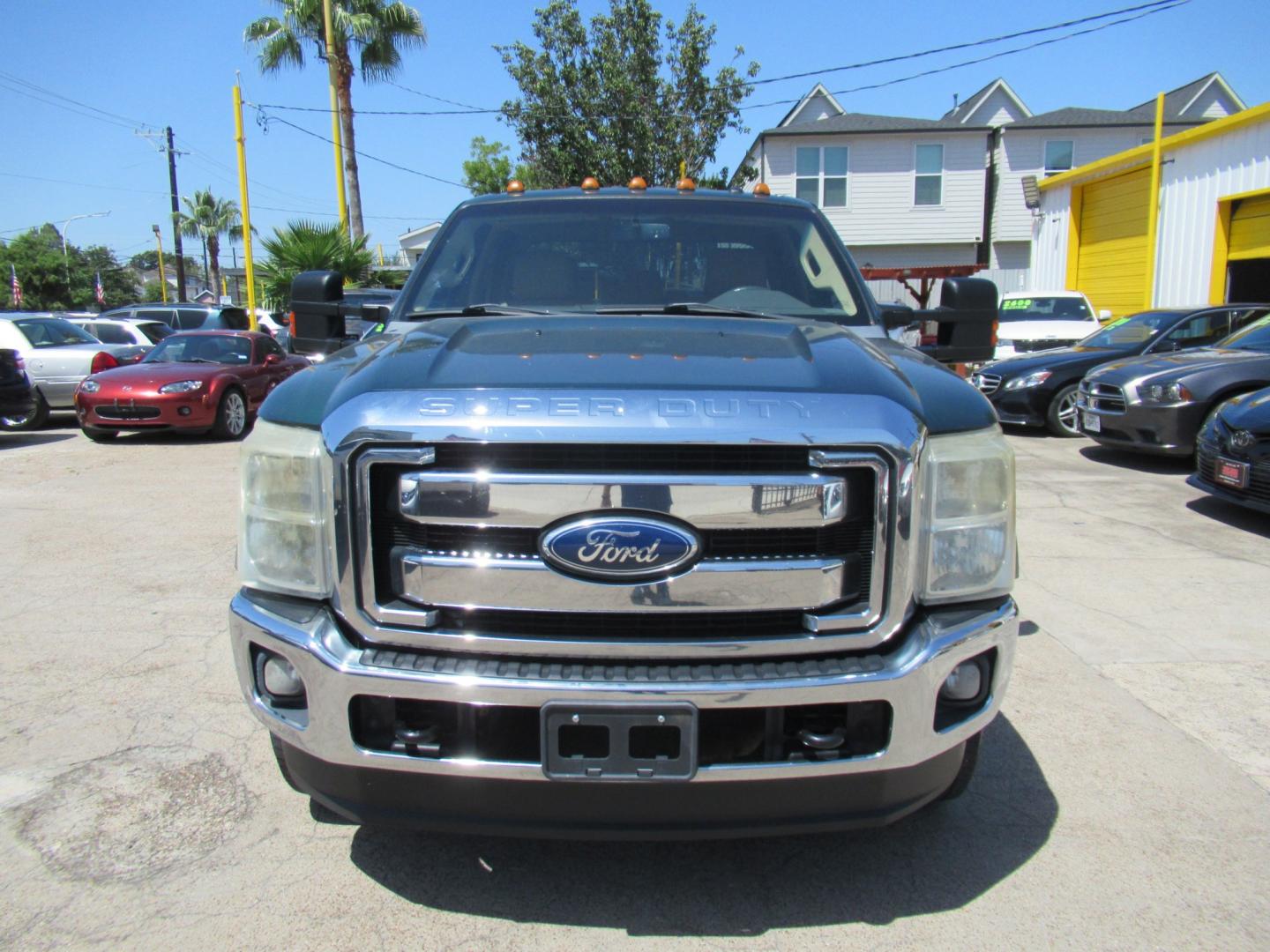 2012 Green /Tan Ford F-250 SD King Ranch Crew Cab 4WD (1FT7W2B62CE) with an 6.2L V8 OHV 16V engine, 6-Speed Automatic transmission, located at 1511 North Shepherd Dr., Houston, TX, 77008, (281) 657-1221, 29.798361, -95.412560 - 2012 Ford F-250 Super Duty Lariat 202,134 miles VIN: 1FT7W2B62CEA02897 Details Crew Pickup 6.2L V8 F SOHC 16V Gasoline Rear wheel drive w/ 4X4- Photo#24