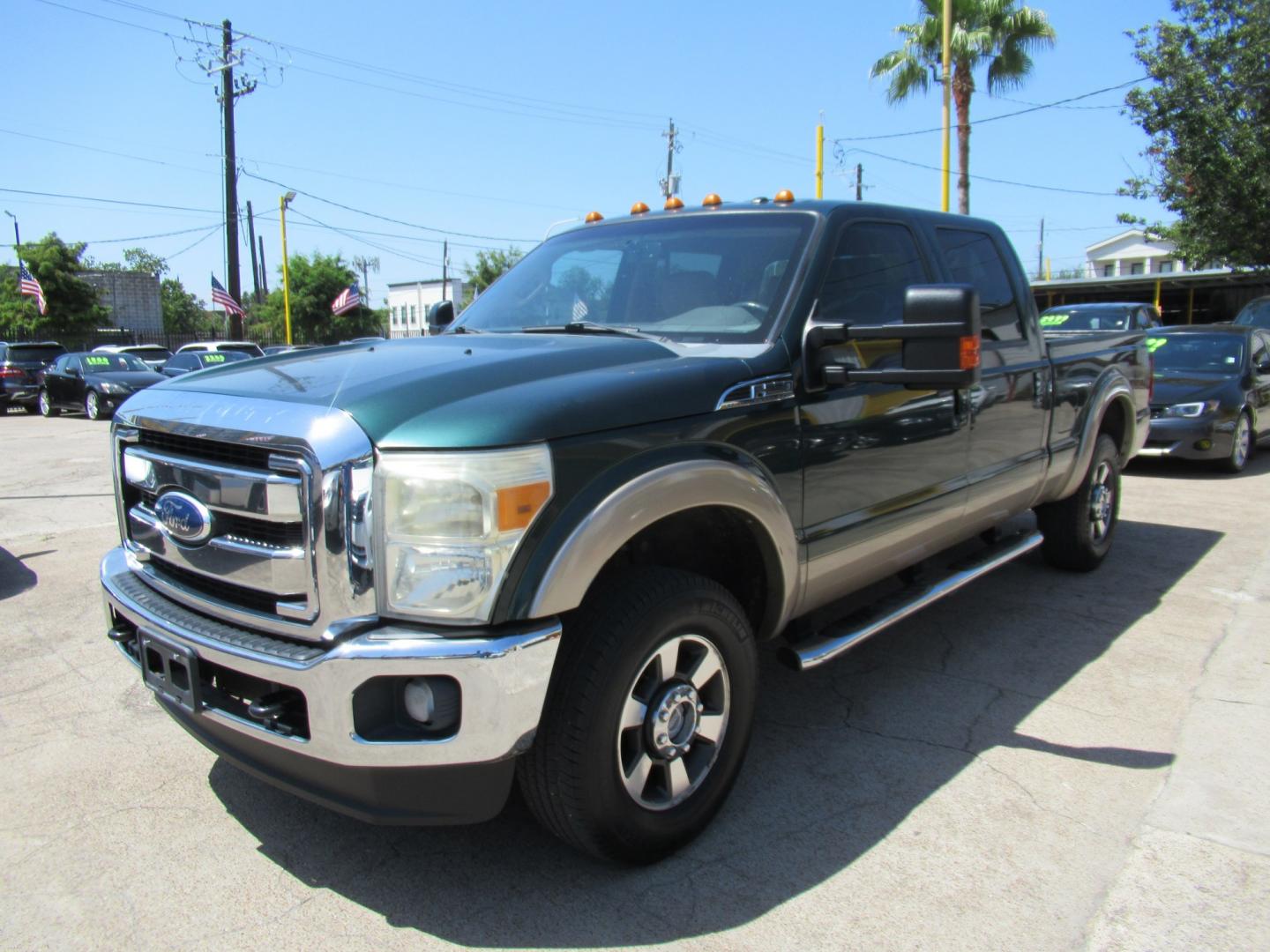 2012 Green /Tan Ford F-250 SD King Ranch Crew Cab 4WD (1FT7W2B62CE) with an 6.2L V8 OHV 16V engine, 6-Speed Automatic transmission, located at 1511 North Shepherd Dr., Houston, TX, 77008, (281) 657-1221, 29.798361, -95.412560 - 2012 Ford F-250 Super Duty Lariat 202,134 miles VIN: 1FT7W2B62CEA02897 Details Crew Pickup 6.2L V8 F SOHC 16V Gasoline Rear wheel drive w/ 4X4- Photo#25