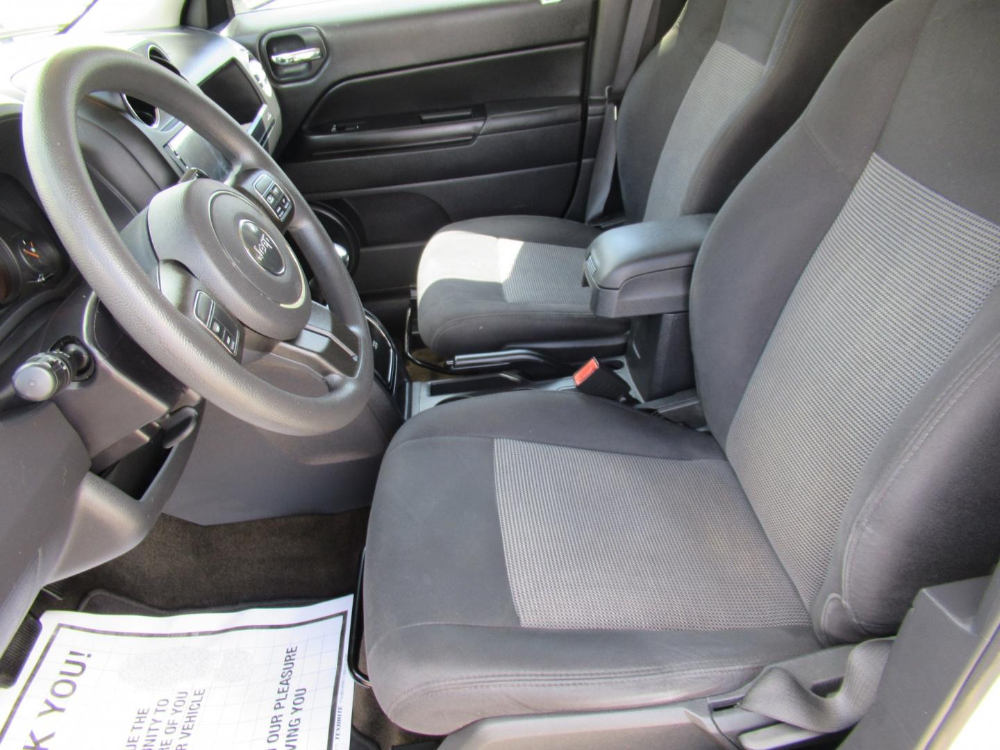 2016 White /Black Jeep Patriot Sport 2WD (1C4NJPBBXGD) with an 2.4L L4 DOHC 16V engine, Automatic transmission, located at 1511 North Shepherd Dr., Houston, TX, 77008, (281) 657-1221, 29.798361, -95.412560 - 2016 Jeep Patriot Sport 140,465 miles VIN: 1C4NJPBBXGD583030 Vehicle Details 4 Door Wagon/Sport Utility 2.4L I4 F DOHC 16V Gasoline Front wheel drive- Photo#6