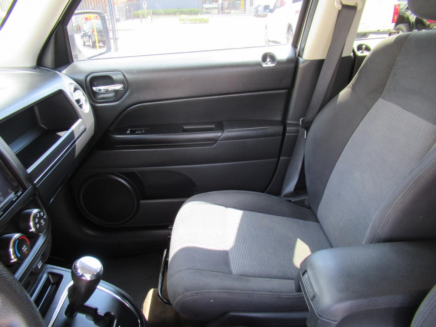 2016 White /Black Jeep Patriot Sport 2WD (1C4NJPBBXGD) with an 2.4L L4 DOHC 16V engine, Automatic transmission, located at 1511 North Shepherd Dr., Houston, TX, 77008, (281) 657-1221, 29.798361, -95.412560 - 2016 Jeep Patriot Sport 140,465 miles VIN: 1C4NJPBBXGD583030 Vehicle Details 4 Door Wagon/Sport Utility 2.4L I4 F DOHC 16V Gasoline Front wheel drive- Photo#7