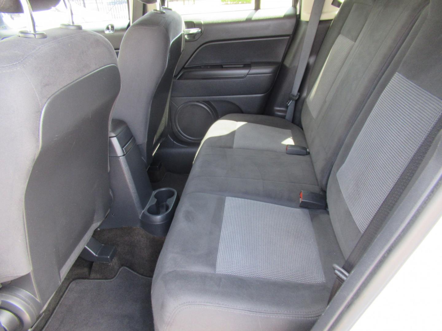2016 White /Black Jeep Patriot Sport 2WD (1C4NJPBBXGD) with an 2.4L L4 DOHC 16V engine, Automatic transmission, located at 1511 North Shepherd Dr., Houston, TX, 77008, (281) 657-1221, 29.798361, -95.412560 - 2016 Jeep Patriot Sport 140,465 miles VIN: 1C4NJPBBXGD583030 Vehicle Details 4 Door Wagon/Sport Utility 2.4L I4 F DOHC 16V Gasoline Front wheel drive- Photo#8