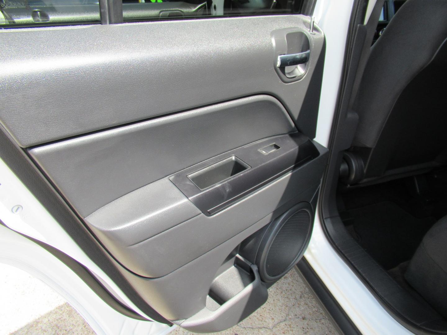 2016 White /Black Jeep Patriot Sport 2WD (1C4NJPBBXGD) with an 2.4L L4 DOHC 16V engine, Automatic transmission, located at 1511 North Shepherd Dr., Houston, TX, 77008, (281) 657-1221, 29.798361, -95.412560 - 2016 Jeep Patriot Sport 140,465 miles VIN: 1C4NJPBBXGD583030 Vehicle Details 4 Door Wagon/Sport Utility 2.4L I4 F DOHC 16V Gasoline Front wheel drive- Photo#9