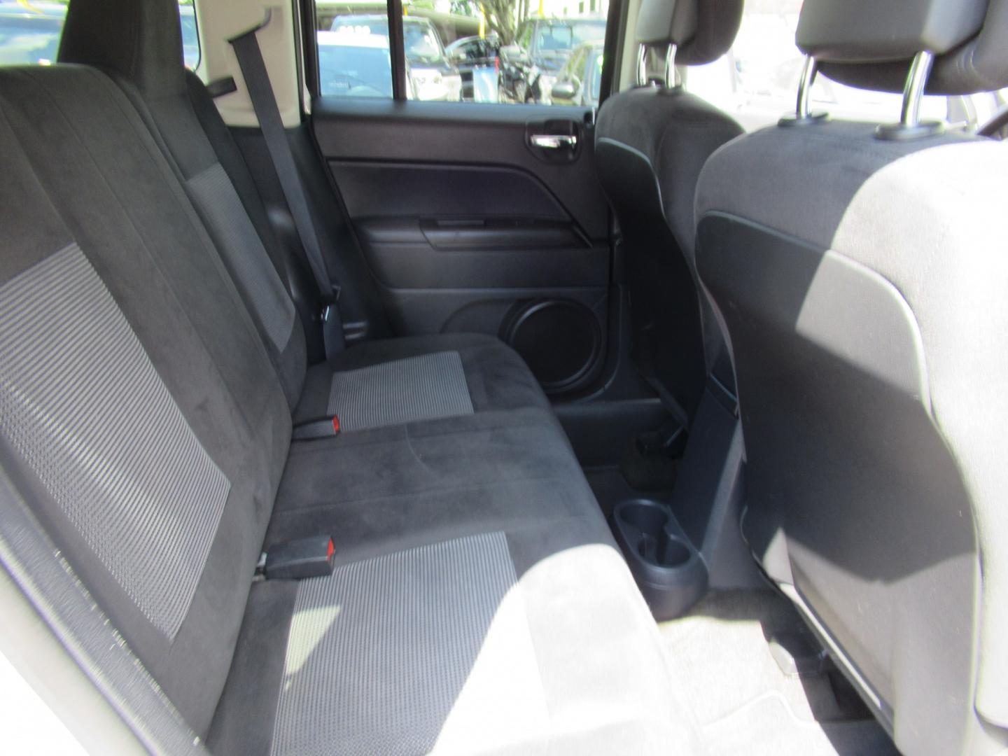 2016 White /Black Jeep Patriot Sport 2WD (1C4NJPBBXGD) with an 2.4L L4 DOHC 16V engine, Automatic transmission, located at 1511 North Shepherd Dr., Houston, TX, 77008, (281) 657-1221, 29.798361, -95.412560 - 2016 Jeep Patriot Sport 140,465 miles VIN: 1C4NJPBBXGD583030 Vehicle Details 4 Door Wagon/Sport Utility 2.4L I4 F DOHC 16V Gasoline Front wheel drive- Photo#11