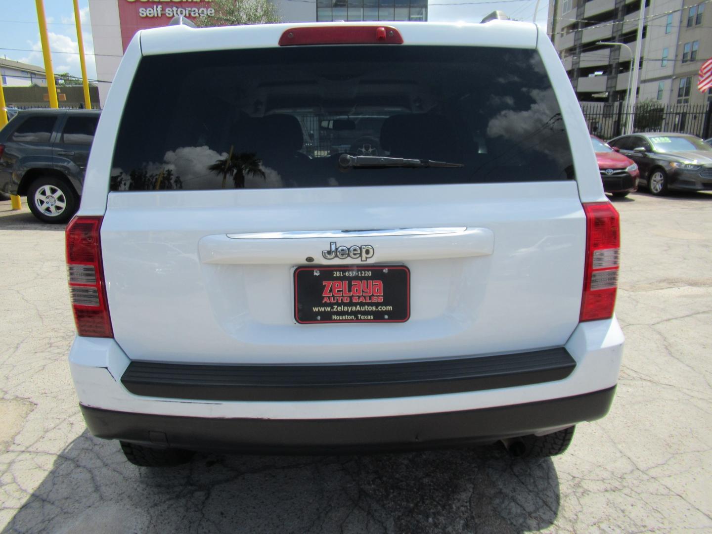 2016 White /Black Jeep Patriot Sport 2WD (1C4NJPBBXGD) with an 2.4L L4 DOHC 16V engine, Automatic transmission, located at 1511 North Shepherd Dr., Houston, TX, 77008, (281) 657-1221, 29.798361, -95.412560 - 2016 Jeep Patriot Sport 140,465 miles VIN: 1C4NJPBBXGD583030 Vehicle Details 4 Door Wagon/Sport Utility 2.4L I4 F DOHC 16V Gasoline Front wheel drive- Photo#16