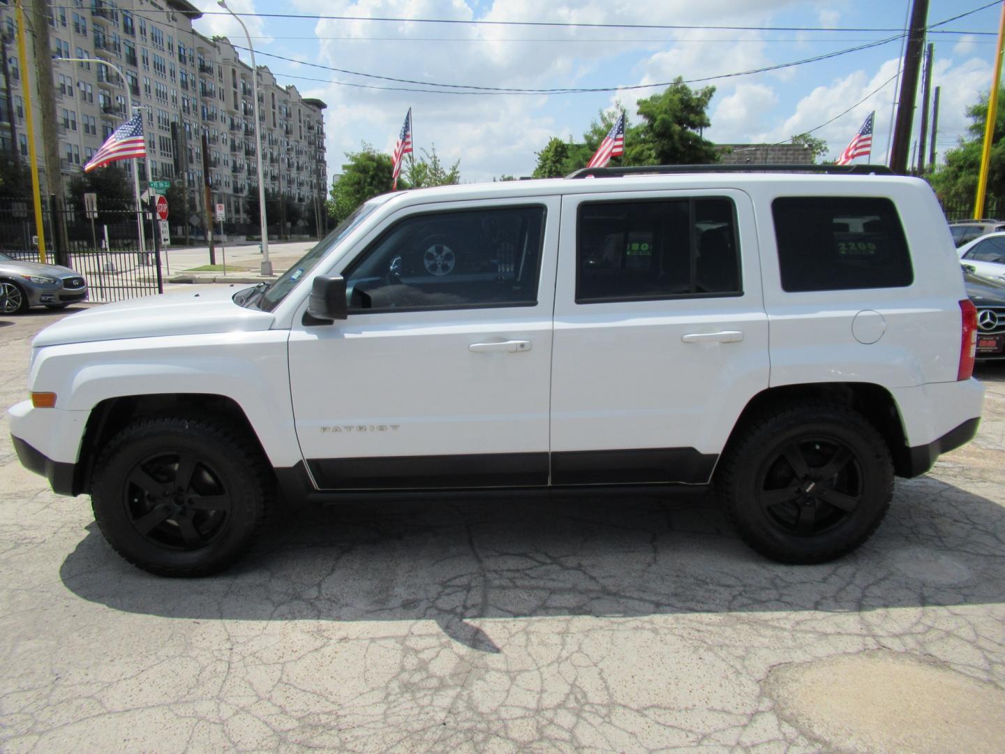 2016 White /Black Jeep Patriot Sport 2WD (1C4NJPBBXGD) with an 2.4L L4 DOHC 16V engine, Automatic transmission, located at 1511 North Shepherd Dr., Houston, TX, 77008, (281) 657-1221, 29.798361, -95.412560 - 2016 Jeep Patriot Sport 140,465 miles VIN: 1C4NJPBBXGD583030 Vehicle Details 4 Door Wagon/Sport Utility 2.4L I4 F DOHC 16V Gasoline Front wheel drive- Photo#21