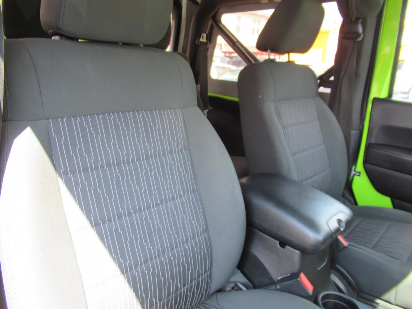 2012 Green /Black Jeep Wrangler Sport 4WD (1C4AJWAG0CL) with an 3.6L V6 DOHC 24V FFV engine, Automatic transmission, located at 1511 North Shepherd Dr., Houston, TX, 77008, (281) 657-1221, 29.798361, -95.412560 - 2012 Jeep Wrangler Sport VIN: 1C4AJWAG0CL279419 Vehicle Details Utility (Blazer, Jimmy, Scout, etc.) 3.6L V6 F DOHC 24V Gasoline Rear wheel drive w/ 4X4- Photo#3