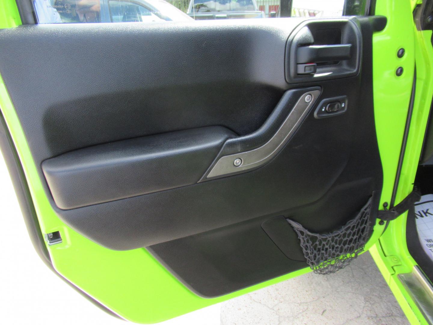 2012 Green /Black Jeep Wrangler Sport 4WD (1C4AJWAG0CL) with an 3.6L V6 DOHC 24V FFV engine, Automatic transmission, located at 1511 North Shepherd Dr., Houston, TX, 77008, (281) 657-1221, 29.798361, -95.412560 - 2012 Jeep Wrangler Sport VIN: 1C4AJWAG0CL279419 Vehicle Details Utility (Blazer, Jimmy, Scout, etc.) 3.6L V6 F DOHC 24V Gasoline Rear wheel drive w/ 4X4- Photo#11