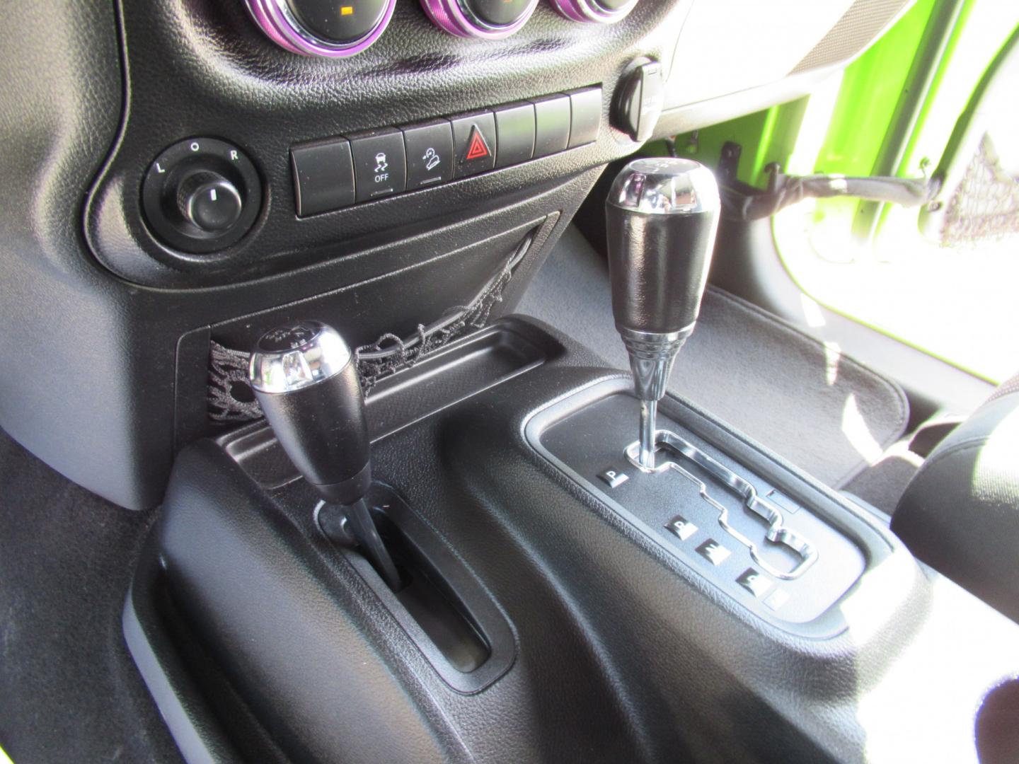 2012 Green /Black Jeep Wrangler Sport 4WD (1C4AJWAG0CL) with an 3.6L V6 DOHC 24V FFV engine, Automatic transmission, located at 1511 North Shepherd Dr., Houston, TX, 77008, (281) 657-1221, 29.798361, -95.412560 - 2012 Jeep Wrangler Sport VIN: 1C4AJWAG0CL279419 Vehicle Details Utility (Blazer, Jimmy, Scout, etc.) 3.6L V6 F DOHC 24V Gasoline Rear wheel drive w/ 4X4- Photo#12
