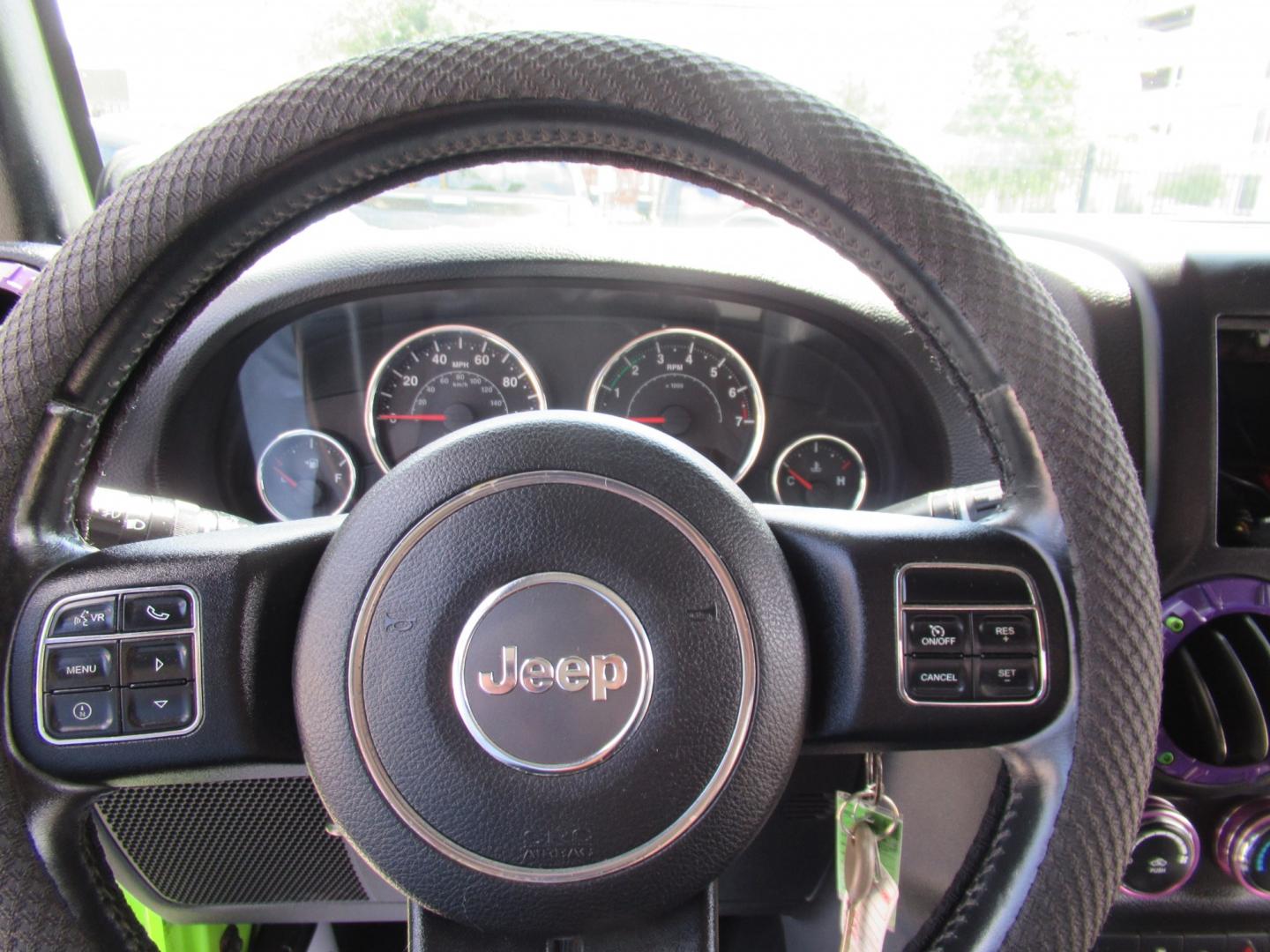 2012 Green /Black Jeep Wrangler Sport 4WD (1C4AJWAG0CL) with an 3.6L V6 DOHC 24V FFV engine, Automatic transmission, located at 1511 North Shepherd Dr., Houston, TX, 77008, (281) 657-1221, 29.798361, -95.412560 - 2012 Jeep Wrangler Sport VIN: 1C4AJWAG0CL279419 Vehicle Details Utility (Blazer, Jimmy, Scout, etc.) 3.6L V6 F DOHC 24V Gasoline Rear wheel drive w/ 4X4- Photo#13