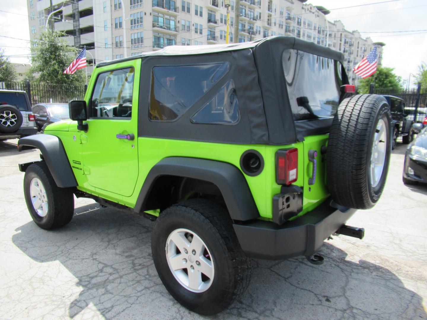 2012 Green /Black Jeep Wrangler Sport 4WD (1C4AJWAG0CL) with an 3.6L V6 DOHC 24V FFV engine, Automatic transmission, located at 1511 North Shepherd Dr., Houston, TX, 77008, (281) 657-1221, 29.798361, -95.412560 - 2012 Jeep Wrangler Sport VIN: 1C4AJWAG0CL279419 Vehicle Details Utility (Blazer, Jimmy, Scout, etc.) 3.6L V6 F DOHC 24V Gasoline Rear wheel drive w/ 4X4- Photo#16
