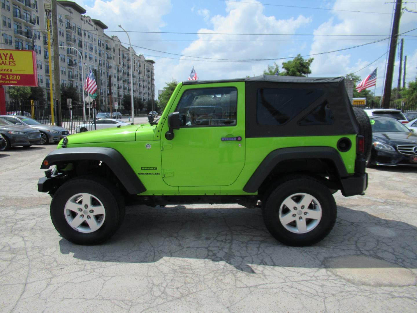 2012 Green /Black Jeep Wrangler Sport 4WD (1C4AJWAG0CL) with an 3.6L V6 DOHC 24V FFV engine, Automatic transmission, located at 1511 North Shepherd Dr., Houston, TX, 77008, (281) 657-1221, 29.798361, -95.412560 - 2012 Jeep Wrangler Sport VIN: 1C4AJWAG0CL279419 Vehicle Details Utility (Blazer, Jimmy, Scout, etc.) 3.6L V6 F DOHC 24V Gasoline Rear wheel drive w/ 4X4- Photo#15