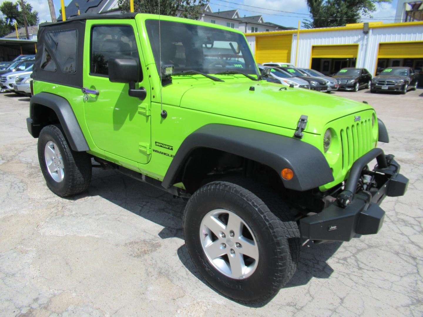 2012 Green /Black Jeep Wrangler Sport 4WD (1C4AJWAG0CL) with an 3.6L V6 DOHC 24V FFV engine, Automatic transmission, located at 1511 North Shepherd Dr., Houston, TX, 77008, (281) 657-1221, 29.798361, -95.412560 - 2012 Jeep Wrangler Sport VIN: 1C4AJWAG0CL279419 Vehicle Details Utility (Blazer, Jimmy, Scout, etc.) 3.6L V6 F DOHC 24V Gasoline Rear wheel drive w/ 4X4- Photo#20