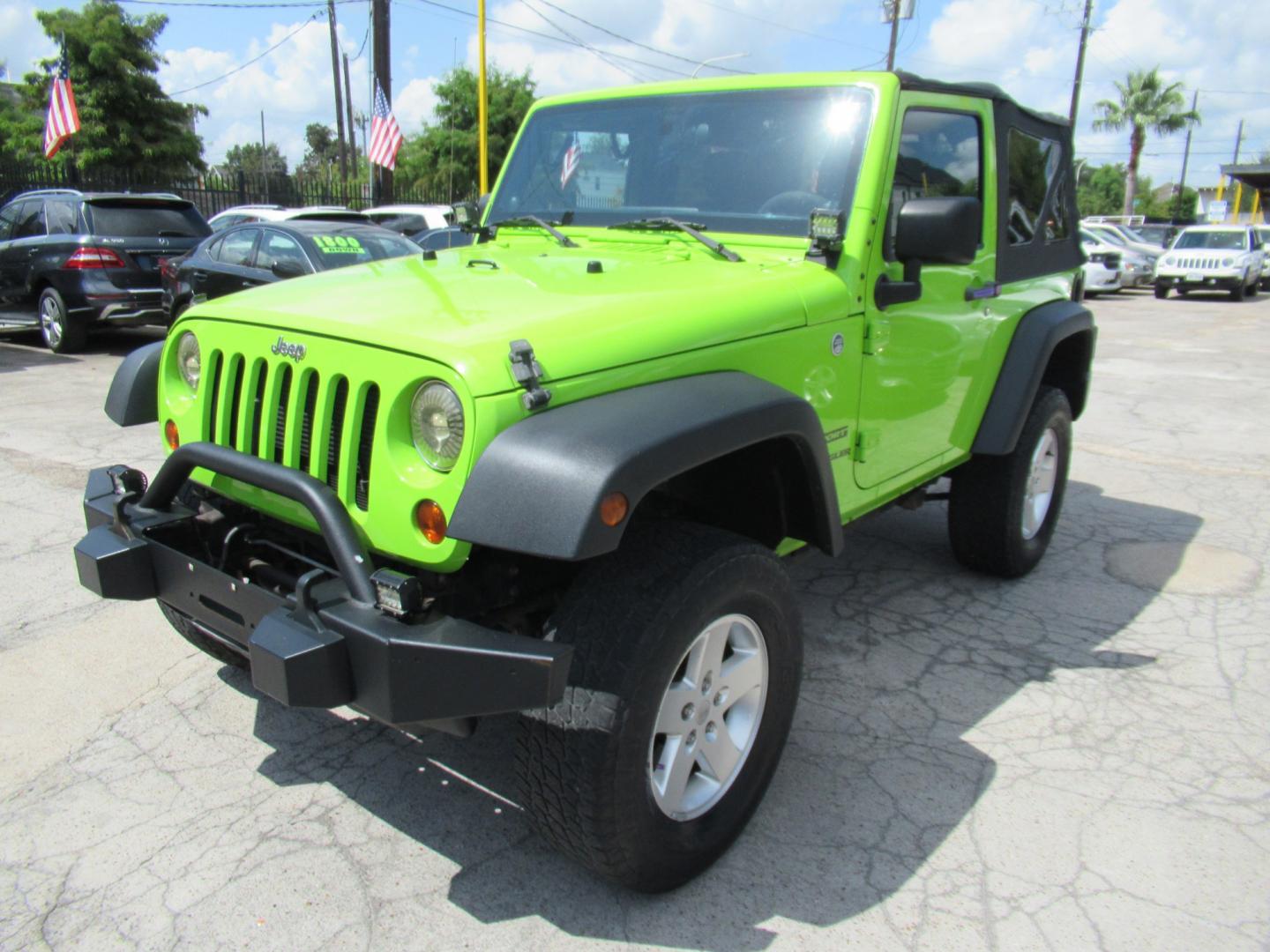 2012 Green /Black Jeep Wrangler Sport 4WD (1C4AJWAG0CL) with an 3.6L V6 DOHC 24V FFV engine, Automatic transmission, located at 1511 North Shepherd Dr., Houston, TX, 77008, (281) 657-1221, 29.798361, -95.412560 - 2012 Jeep Wrangler Sport VIN: 1C4AJWAG0CL279419 Vehicle Details Utility (Blazer, Jimmy, Scout, etc.) 3.6L V6 F DOHC 24V Gasoline Rear wheel drive w/ 4X4- Photo#22