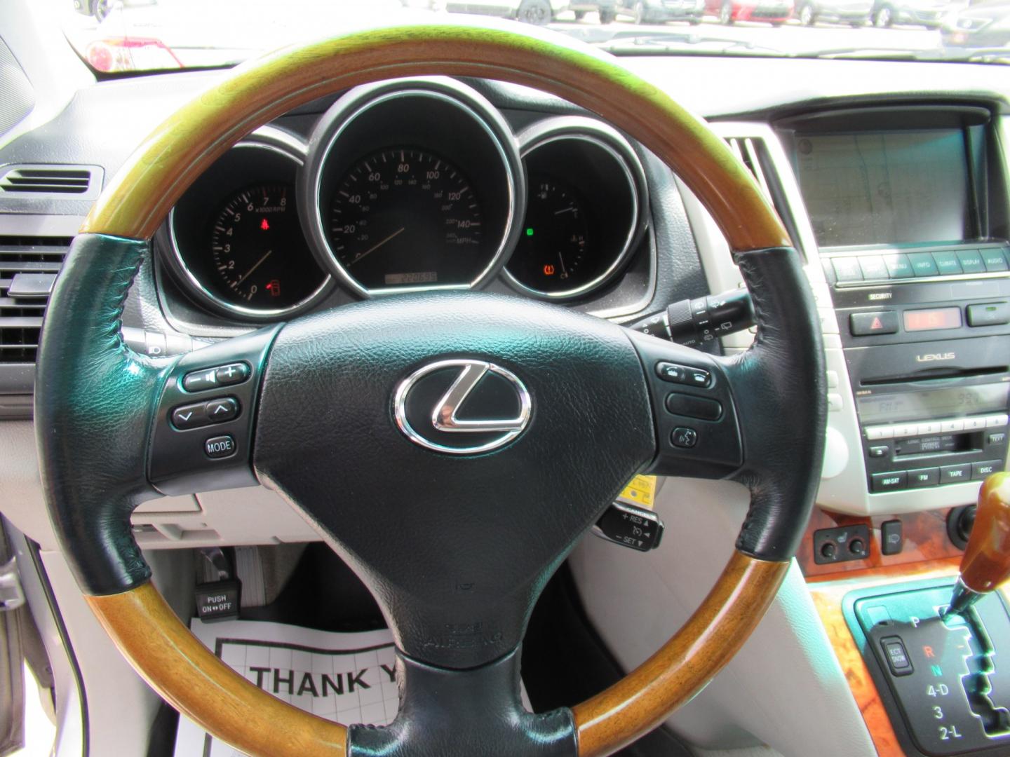 2009 Silver /Gray Lexus RX 350 FWD (2T2GK31U59C) with an 3.5L V6 DOHC 24V engine, 5A OD transmission, located at 1511 North Shepherd Dr., Houston, TX, 77008, (281) 657-1221, 29.798361, -95.412560- Photo#3