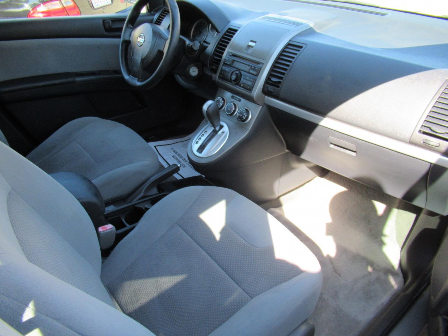 2012 Gray /Gray Nissan Sentra 2.0 (3N1AB6APXCL) with an 2.0L L4 DOHC 16V engine, Continuously Variable Transmission transmission, located at 1511 North Shepherd Dr., Houston, TX, 77008, (281) 657-1221, 29.798361, -95.412560 - 2012 Nissan Sentra 2.0 S VIN: 3N1AB6APXCL627862 Vehicle Details Sedan 4 DR 2.0L I4 F DOHC 16V Gasoline Front wheel drive- Photo#9