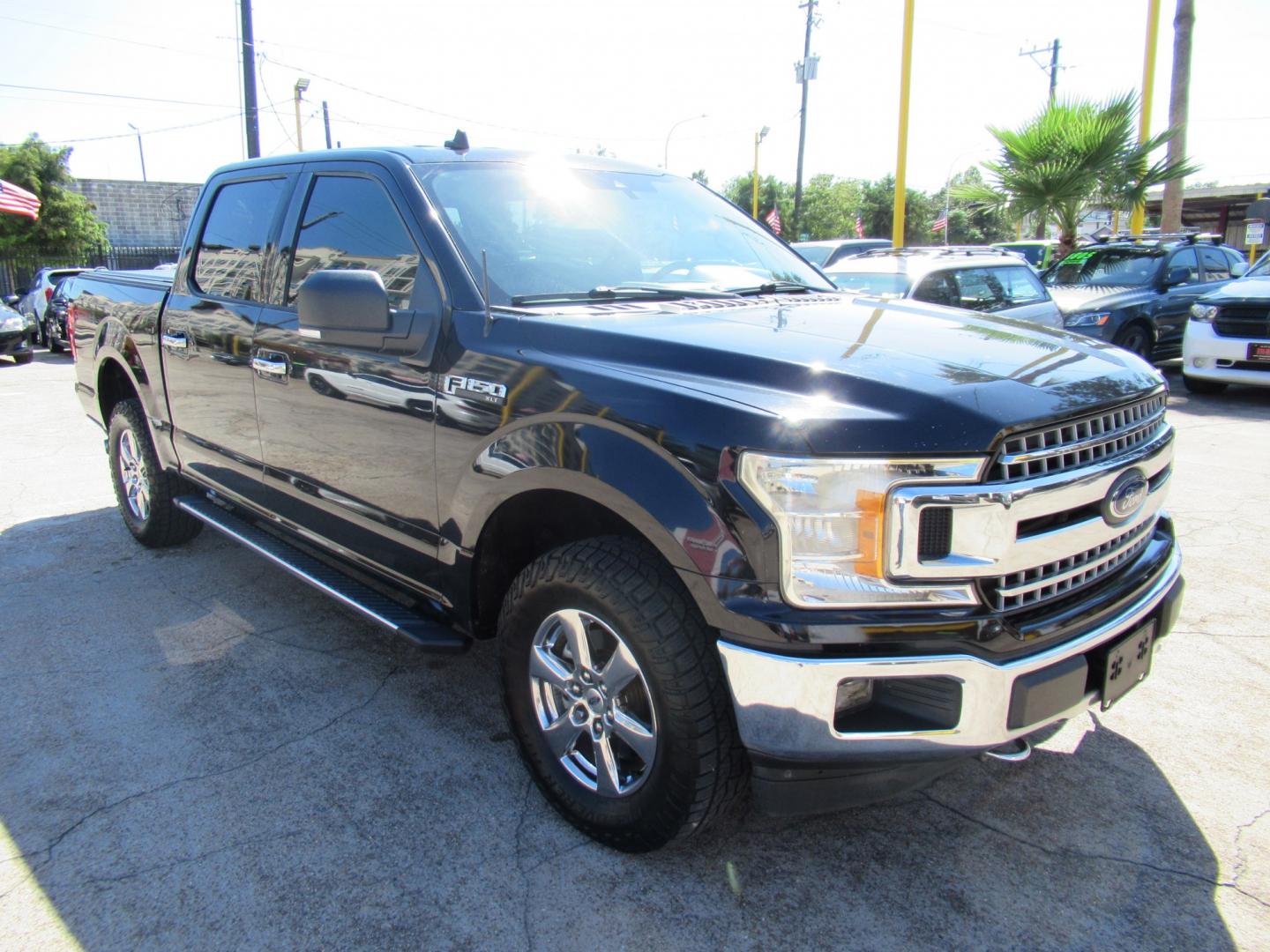 2019 Black /Black Ford F-150 XLT SuperCrew 6.5-ft. Bed 4WD (1FTEW1E49KK) with an 3.5L V6 TURBO engine, 6A transmission, located at 1511 North Shepherd Dr., Houston, TX, 77008, (281) 657-1221, 29.798361, -95.412560 - 2019 Ford F-150 XLT VIN: 1FTEW1E49KKE46337 Vehicle Details Crew Pickup 3.5L V6 F DOHC 24V Gasoline Rear wheel drive w/ 4X4- Photo#7
