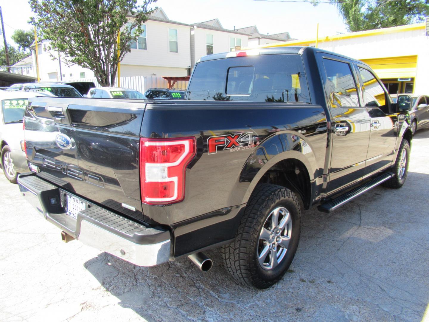 2019 Black /Black Ford F-150 XLT SuperCrew 6.5-ft. Bed 4WD (1FTEW1E49KK) with an 3.5L V6 TURBO engine, 6A transmission, located at 1511 North Shepherd Dr., Houston, TX, 77008, (281) 657-1221, 29.798361, -95.412560 - 2019 Ford F-150 XLT VIN: 1FTEW1E49KKE46337 Vehicle Details Crew Pickup 3.5L V6 F DOHC 24V Gasoline Rear wheel drive w/ 4X4- Photo#9
