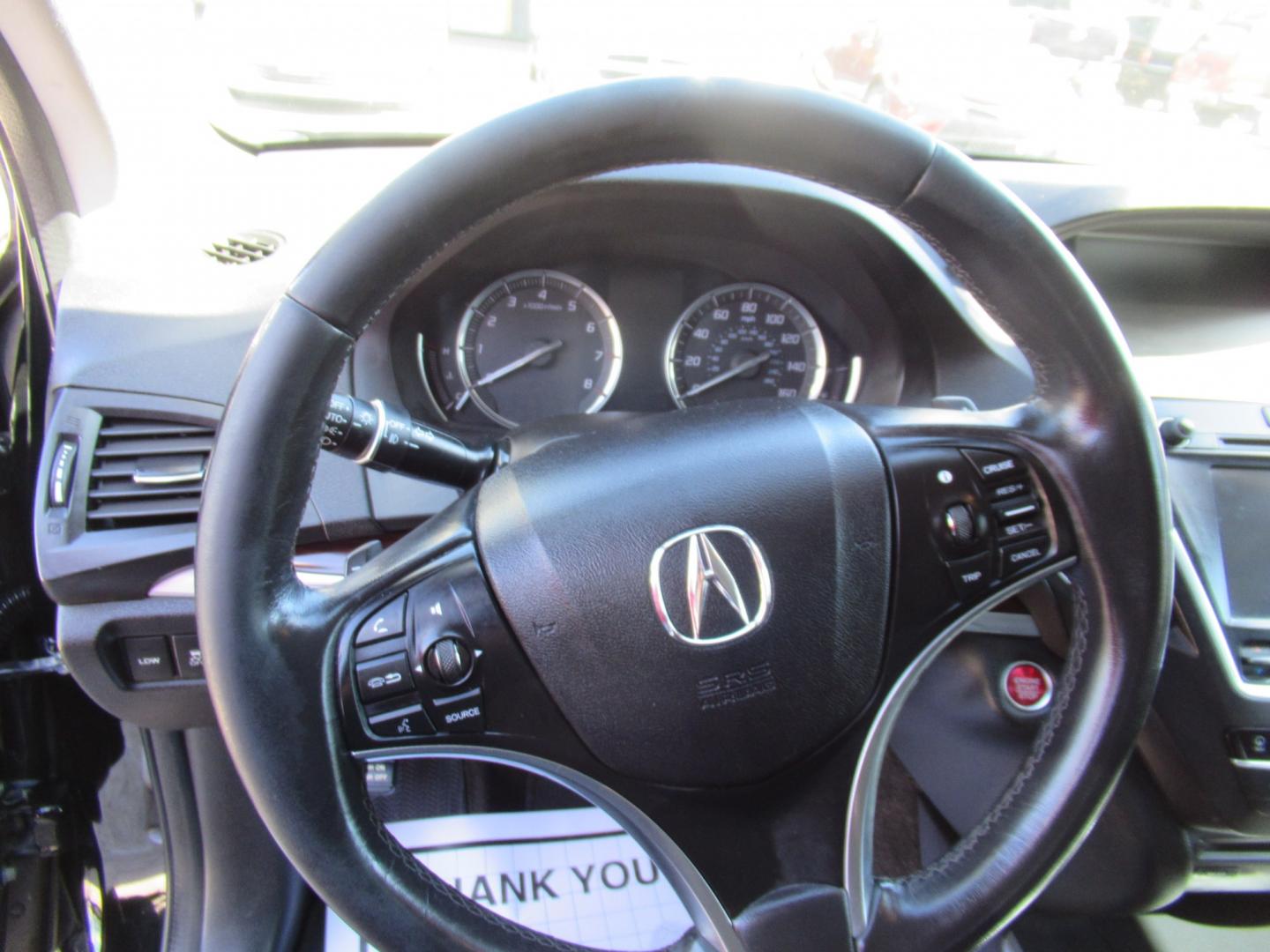 2014 Black /Black Acura MDX 6-Spd AT w/Tech and Entertainment Package (5FRYD3H64EB) with an 3.5L V6 SOHC 24V engine, 6-Speed Automatic transmission, located at 1511 North Shepherd Dr., Houston, TX, 77008, (281) 657-1221, 29.798361, -95.412560 - 2014 Acura MDX W/Tech W/Res VIN: 5FRYD3H64EB010815 Vehicle Details 4 Door Wagon/Sport Utility 3.5L V6 F SOHC 24V Gasoline Front wheel drive- Photo#3
