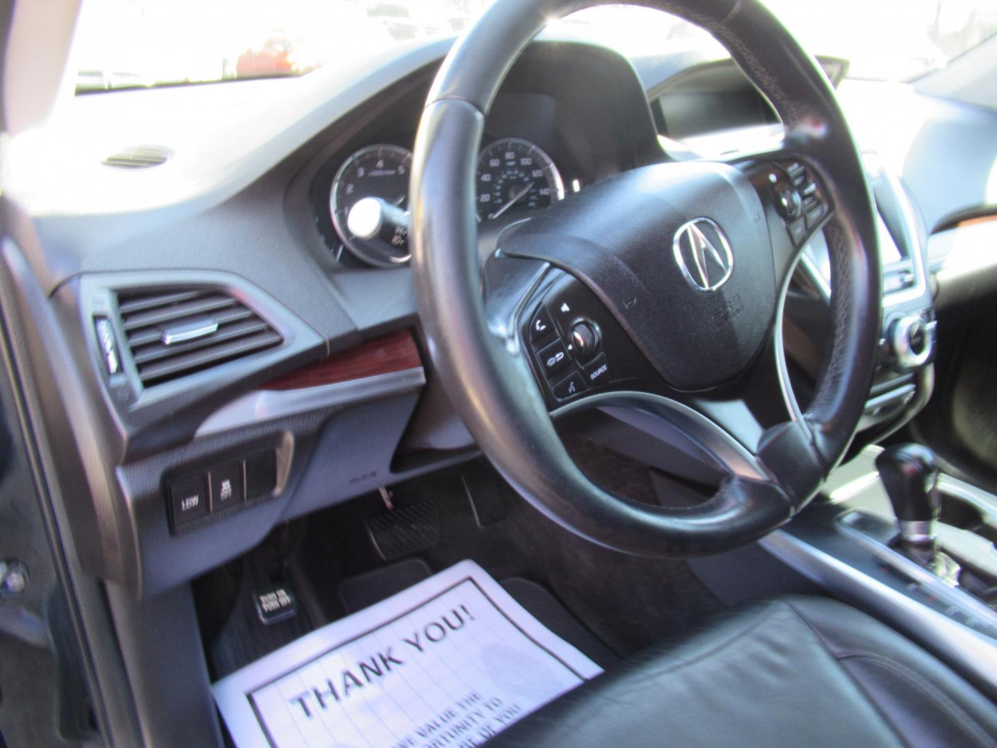 2014 Black /Black Acura MDX 6-Spd AT w/Tech and Entertainment Package (5FRYD3H64EB) with an 3.5L V6 SOHC 24V engine, 6-Speed Automatic transmission, located at 1511 North Shepherd Dr., Houston, TX, 77008, (281) 657-1221, 29.798361, -95.412560 - 2014 Acura MDX W/Tech W/Res VIN: 5FRYD3H64EB010815 Vehicle Details 4 Door Wagon/Sport Utility 3.5L V6 F SOHC 24V Gasoline Front wheel drive- Photo#4
