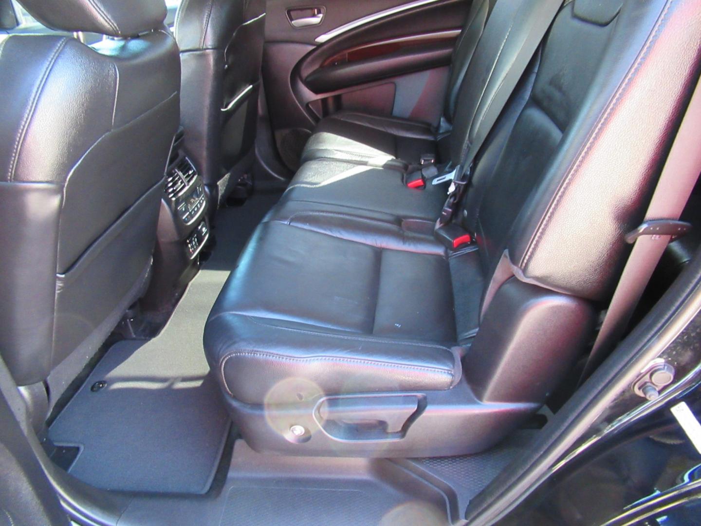 2014 Black /Black Acura MDX 6-Spd AT w/Tech and Entertainment Package (5FRYD3H64EB) with an 3.5L V6 SOHC 24V engine, 6-Speed Automatic transmission, located at 1511 North Shepherd Dr., Houston, TX, 77008, (281) 657-1221, 29.798361, -95.412560 - 2014 Acura MDX W/Tech W/Res VIN: 5FRYD3H64EB010815 Vehicle Details 4 Door Wagon/Sport Utility 3.5L V6 F SOHC 24V Gasoline Front wheel drive- Photo#10