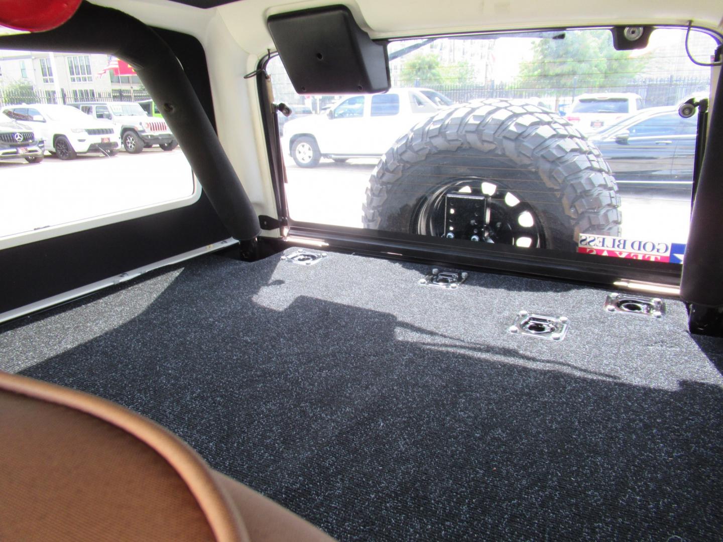 2006 Black /Black Jeep Wrangler Unlimited Rubicon (1J4FA64S96P) with an 4.0L L6 OHV 12V engine, located at 1511 North Shepherd Dr., Houston, TX, 77008, (281) 657-1221, 29.798361, -95.412560 - 2006 Jeep Wrangler Unlimited Rubicon VIN: 1J4FA64S96P782881 Vehicle Details Utility (Blazer, Jimmy, Scout, etc.) 4.0L I6 F Gasoline Rear wheel drive w/ 4X4- Photo#9