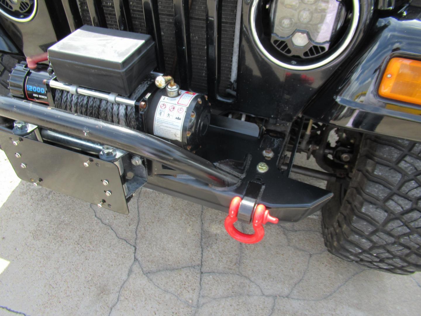 2006 Black /Black Jeep Wrangler Unlimited Rubicon (1J4FA64S96P) with an 4.0L L6 OHV 12V engine, located at 1511 North Shepherd Dr., Houston, TX, 77008, (281) 657-1221, 29.798361, -95.412560 - 2006 Jeep Wrangler Unlimited Rubicon VIN: 1J4FA64S96P782881 Vehicle Details Utility (Blazer, Jimmy, Scout, etc.) 4.0L I6 F Gasoline Rear wheel drive w/ 4X4- Photo#38