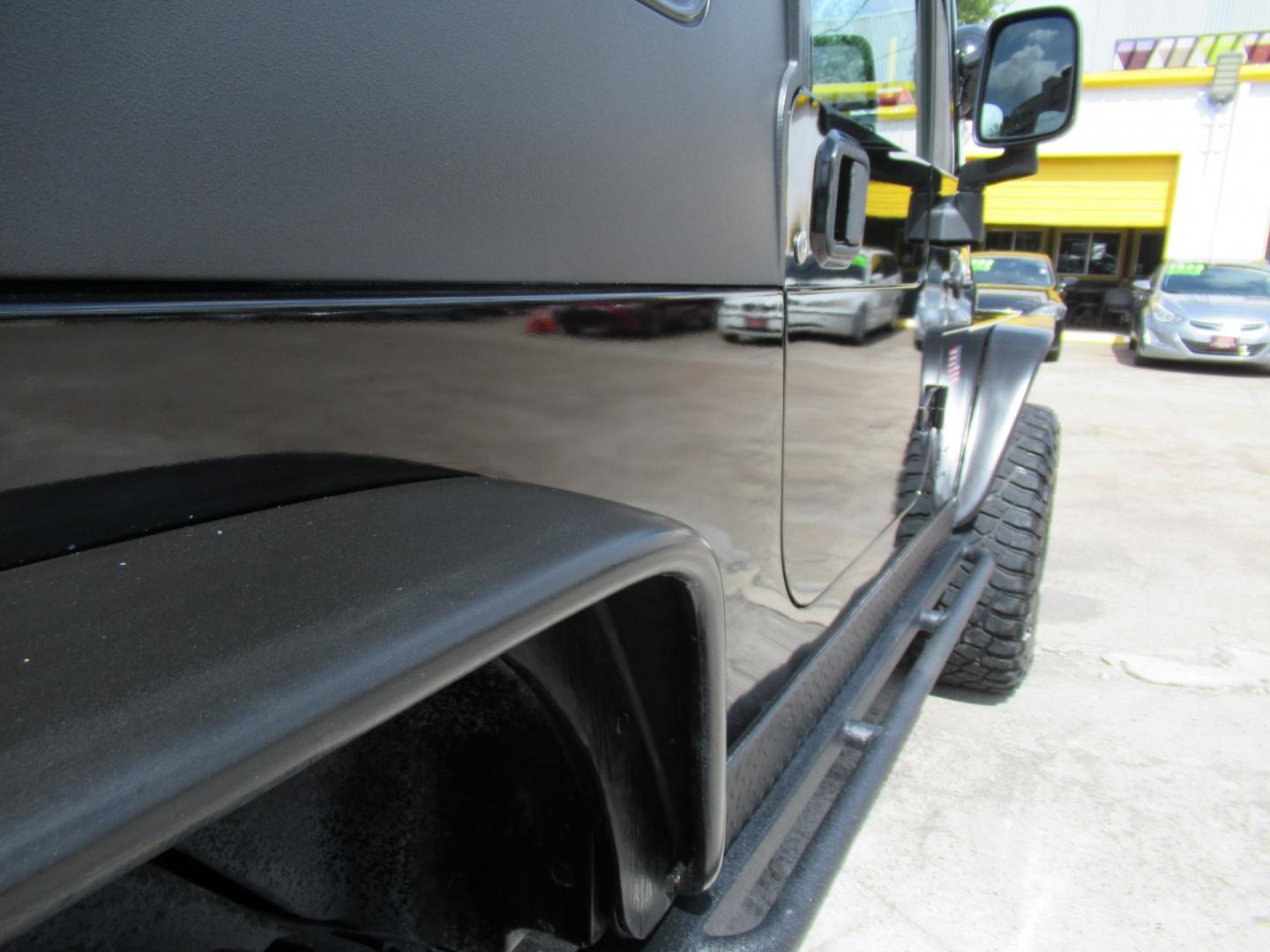 2006 Black /Black Jeep Wrangler Unlimited Rubicon (1J4FA64S96P) with an 4.0L L6 OHV 12V engine, located at 1511 North Shepherd Dr., Houston, TX, 77008, (281) 657-1221, 29.798361, -95.412560 - 2006 Jeep Wrangler Unlimited Rubicon VIN: 1J4FA64S96P782881 Vehicle Details Utility (Blazer, Jimmy, Scout, etc.) 4.0L I6 F Gasoline Rear wheel drive w/ 4X4- Photo#56