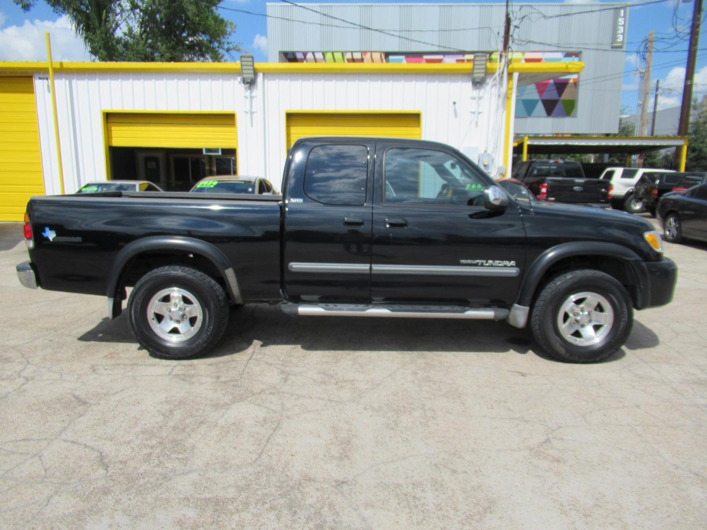 2004 Black /Gray Toyota Tundra SR5 Access Cab 2WD (5TBRT34134S) with an 4.7L V8 DOHC 32V engine, Automatic transmission, located at 1511 North Shepherd Dr., Houston, TX, 77008, (281) 657-1221, 29.798361, -95.412560 - 2004 Toyota Tundra SR5 VIN: 5TBRT34134S444343 Vehicle Details 4 Door Extended Cab Pickup 4.7L V8 F DOHC 32V Gasoline Rear wheel drive- Photo#0