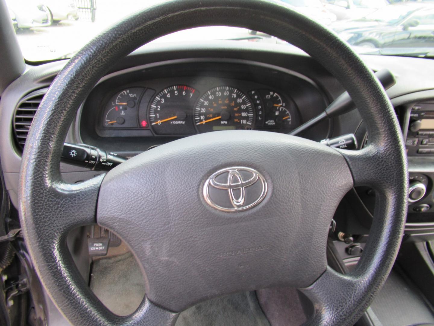 2004 Black /Gray Toyota Tundra SR5 Access Cab 2WD (5TBRT34134S) with an 4.7L V8 DOHC 32V engine, Automatic transmission, located at 1511 North Shepherd Dr., Houston, TX, 77008, (281) 657-1221, 29.798361, -95.412560 - 2004 Toyota Tundra SR5 VIN: 5TBRT34134S444343 Vehicle Details 4 Door Extended Cab Pickup 4.7L V8 F DOHC 32V Gasoline Rear wheel drive- Photo#5