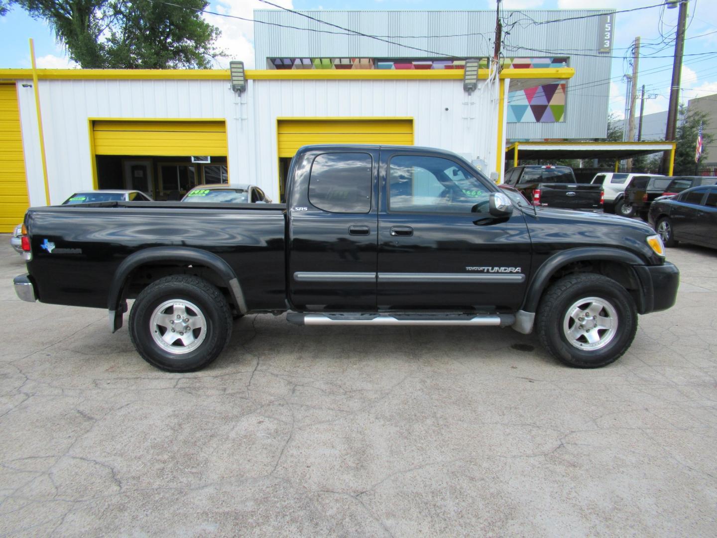 2004 Black /Gray Toyota Tundra SR5 Access Cab 2WD (5TBRT34134S) with an 4.7L V8 DOHC 32V engine, Automatic transmission, located at 1511 North Shepherd Dr., Houston, TX, 77008, (281) 657-1221, 29.798361, -95.412560 - 2004 Toyota Tundra SR5 VIN: 5TBRT34134S444343 Vehicle Details 4 Door Extended Cab Pickup 4.7L V8 F DOHC 32V Gasoline Rear wheel drive- Photo#21