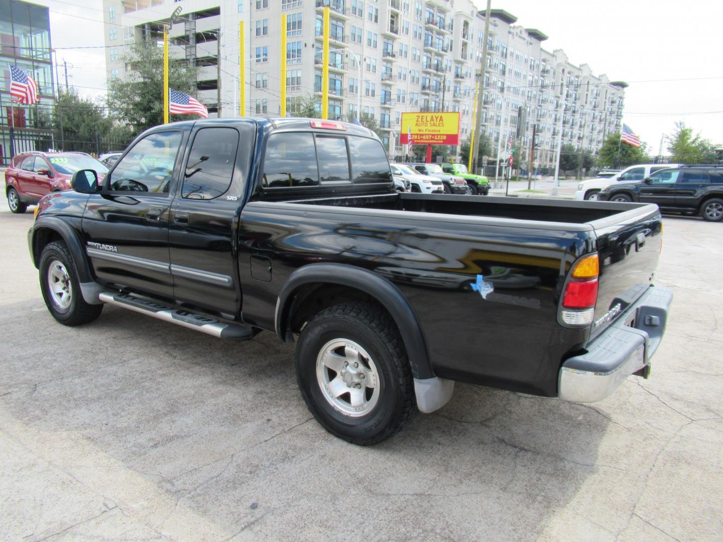 2004 Black /Gray Toyota Tundra SR5 Access Cab 2WD (5TBRT34134S) with an 4.7L V8 DOHC 32V engine, Automatic transmission, located at 1511 North Shepherd Dr., Houston, TX, 77008, (281) 657-1221, 29.798361, -95.412560 - 2004 Toyota Tundra SR5 VIN: 5TBRT34134S444343 Vehicle Details 4 Door Extended Cab Pickup 4.7L V8 F DOHC 32V Gasoline Rear wheel drive- Photo#25