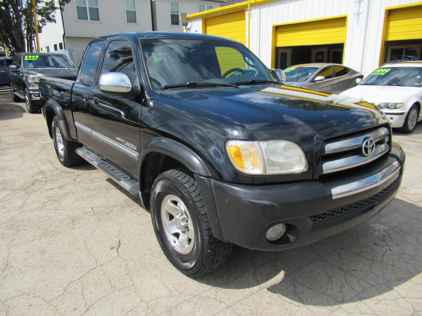 2004 Black /Gray Toyota Tundra SR5 Access Cab 2WD (5TBRT34134S) with an 4.7L V8 DOHC 32V engine, Automatic transmission, located at 1511 North Shepherd Dr., Houston, TX, 77008, (281) 657-1221, 29.798361, -95.412560 - 2004 Toyota Tundra SR5 VIN: 5TBRT34134S444343 Vehicle Details 4 Door Extended Cab Pickup 4.7L V8 F DOHC 32V Gasoline Rear wheel drive- Photo#35