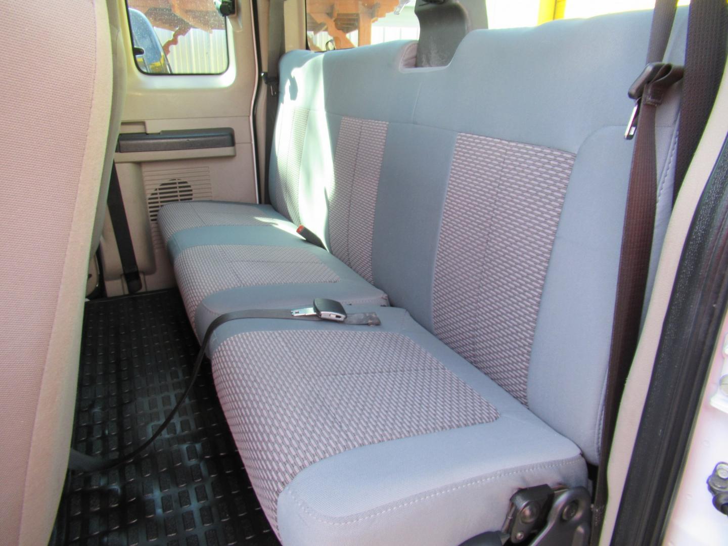 2009 White /Gray Ford F-350 SD FX4 SuperCab 4WD (1FTWX31R59E) with an 6.4L V8 OHV 32V TURBO DIESEL engine, Automatic transmission, located at 1511 North Shepherd Dr., Houston, TX, 77008, (281) 657-1221, 29.798361, -95.412560 - 2009 Ford F-350 Super Duty XL VIN: 1FTWX31R59EA28543 Vehicle Details 4 Door Extended Cab Pickup 6.4L V8 F SOHC Diesel Rear wheel drive w/ 4X4- Photo#2