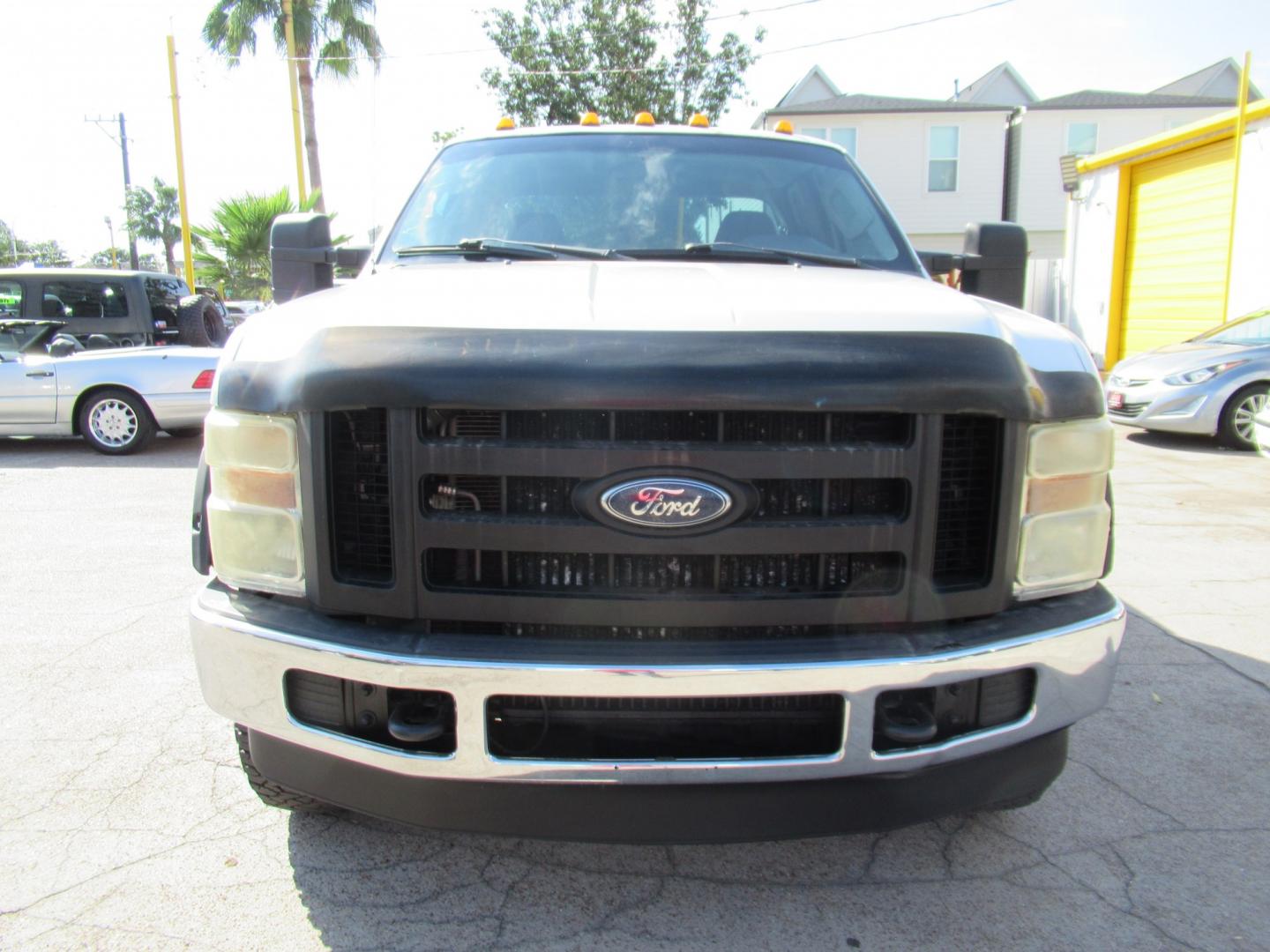 2009 White /Gray Ford F-350 SD FX4 SuperCab 4WD (1FTWX31R59E) with an 6.4L V8 OHV 32V TURBO DIESEL engine, Automatic transmission, located at 1511 North Shepherd Dr., Houston, TX, 77008, (281) 657-1221, 29.798361, -95.412560 - 2009 Ford F-350 Super Duty XL VIN: 1FTWX31R59EA28543 Vehicle Details 4 Door Extended Cab Pickup 6.4L V8 F SOHC Diesel Rear wheel drive w/ 4X4- Photo#16