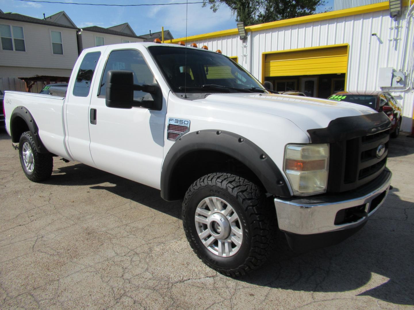 2009 White /Gray Ford F-350 SD FX4 SuperCab 4WD (1FTWX31R59E) with an 6.4L V8 OHV 32V TURBO DIESEL engine, Automatic transmission, located at 1511 North Shepherd Dr., Houston, TX, 77008, (281) 657-1221, 29.798361, -95.412560 - 2009 Ford F-350 Super Duty XL VIN: 1FTWX31R59EA28543 Vehicle Details 4 Door Extended Cab Pickup 6.4L V8 F SOHC Diesel Rear wheel drive w/ 4X4- Photo#15