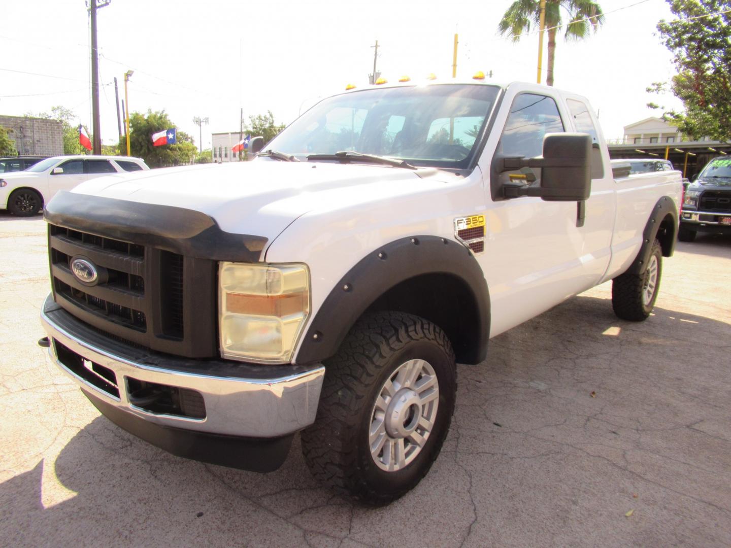 2009 White /Gray Ford F-350 SD FX4 SuperCab 4WD (1FTWX31R59E) with an 6.4L V8 OHV 32V TURBO DIESEL engine, Automatic transmission, located at 1511 North Shepherd Dr., Houston, TX, 77008, (281) 657-1221, 29.798361, -95.412560 - 2009 Ford F-350 Super Duty XL VIN: 1FTWX31R59EA28543 Vehicle Details 4 Door Extended Cab Pickup 6.4L V8 F SOHC Diesel Rear wheel drive w/ 4X4- Photo#17