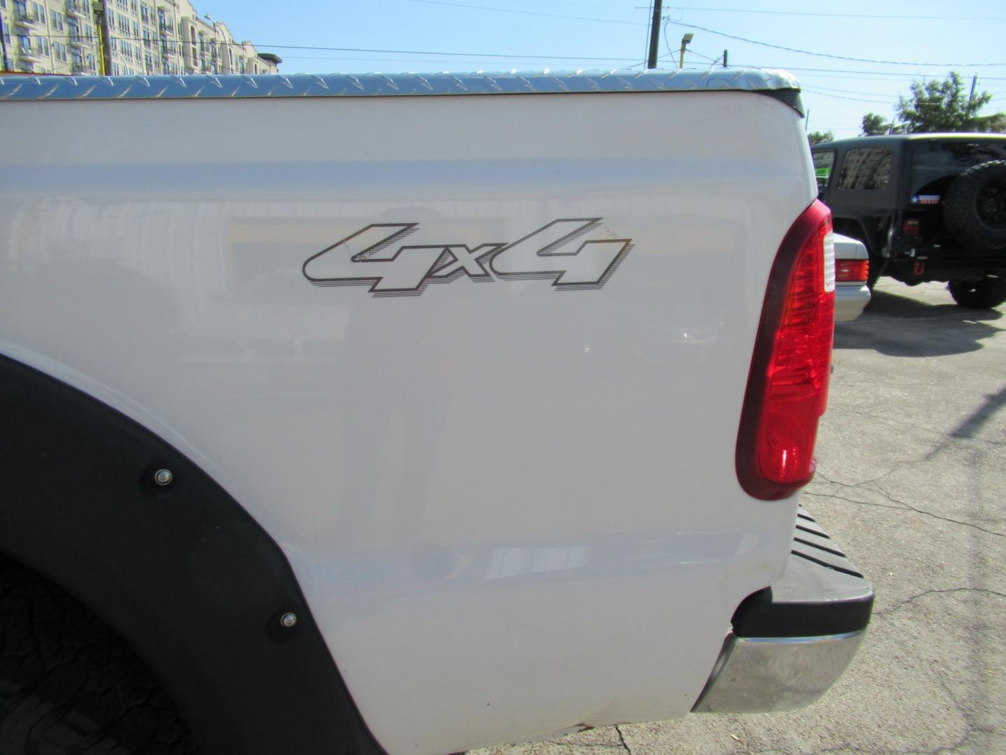 2009 White /Gray Ford F-350 SD FX4 SuperCab 4WD (1FTWX31R59E) with an 6.4L V8 OHV 32V TURBO DIESEL engine, Automatic transmission, located at 1511 North Shepherd Dr., Houston, TX, 77008, (281) 657-1221, 29.798361, -95.412560 - 2009 Ford F-350 Super Duty XL VIN: 1FTWX31R59EA28543 Vehicle Details 4 Door Extended Cab Pickup 6.4L V8 F SOHC Diesel Rear wheel drive w/ 4X4- Photo#20