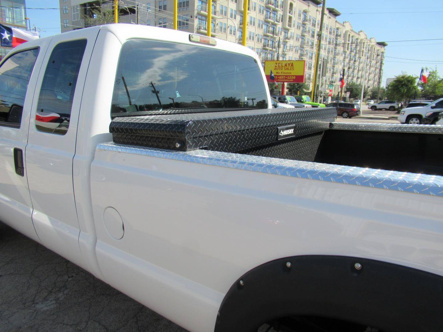 2009 White /Gray Ford F-350 SD FX4 SuperCab 4WD (1FTWX31R59E) with an 6.4L V8 OHV 32V TURBO DIESEL engine, Automatic transmission, located at 1511 North Shepherd Dr., Houston, TX, 77008, (281) 657-1221, 29.798361, -95.412560 - 2009 Ford F-350 Super Duty XL VIN: 1FTWX31R59EA28543 Vehicle Details 4 Door Extended Cab Pickup 6.4L V8 F SOHC Diesel Rear wheel drive w/ 4X4- Photo#19