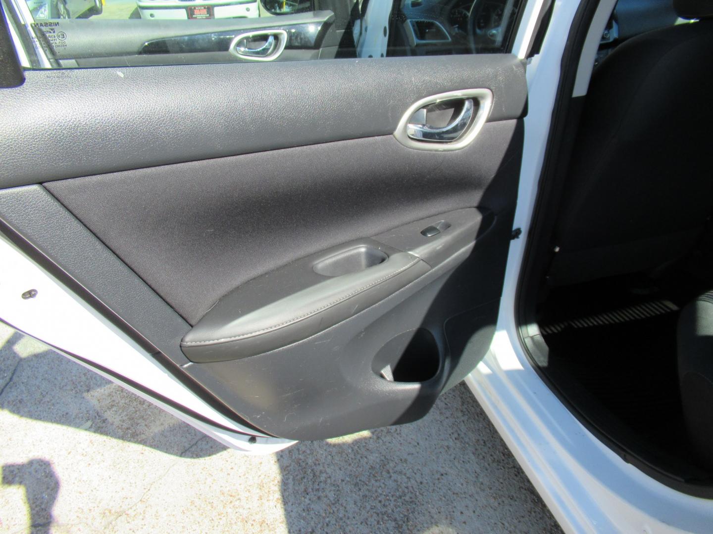 2018 White /Black Nissan Sentra S CVT (3N1AB7APXJL) with an 1.8L L4 SFI DOHC 16V engine, CVT transmission, located at 1511 North Shepherd Dr., Houston, TX, 77008, (281) 657-1221, 29.798361, -95.412560 - 2018 Nissan Sentra SV VIN: 3N1AB7APXJL656510 Vehicle Details Sedan 4 DR 1.8L I4 F DOHC 16V Gasoline Front wheel drive- Photo#7